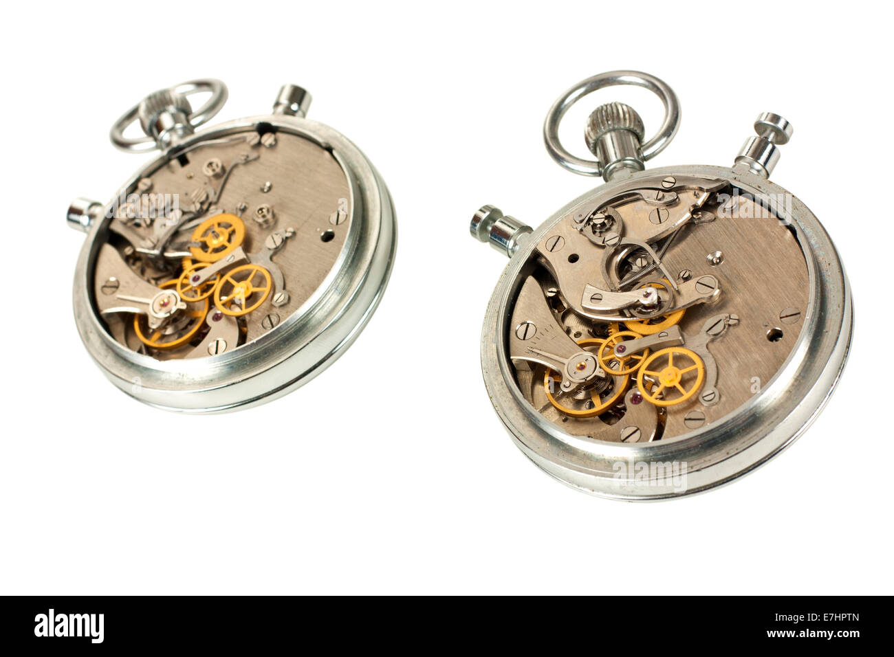 Two clock mechanisms isolated over white with clipping path Stock Photo