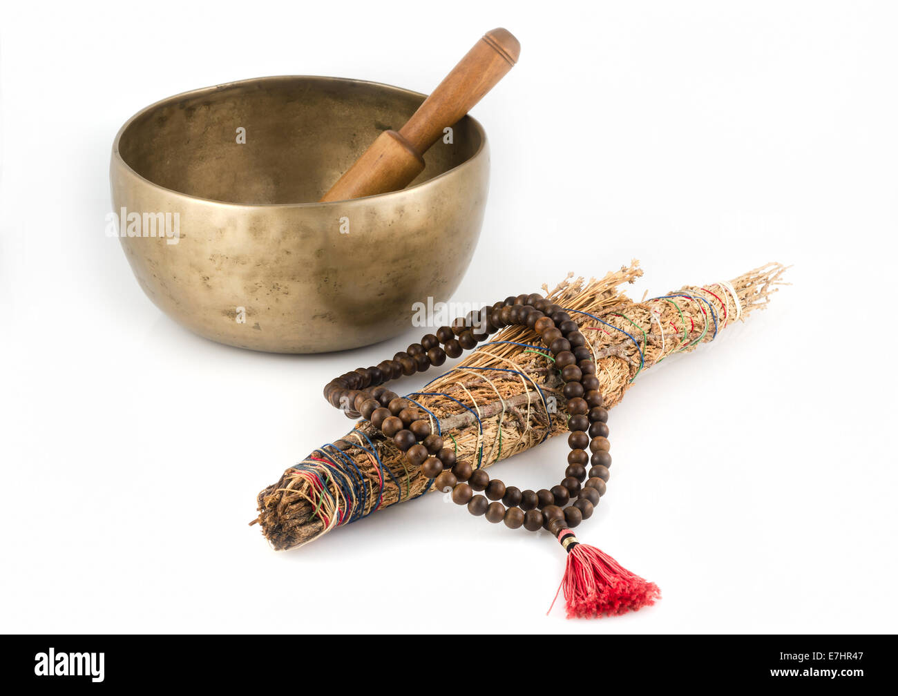 Tibetan Singing Bowl, Prayer Beads and Smudge Stick. Stock Photo