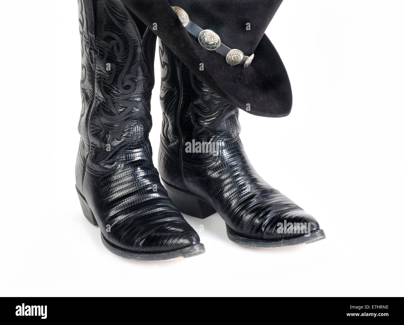 Black Lizard Cowboy Boots and Hat with Concho Hatband. Stock Photo