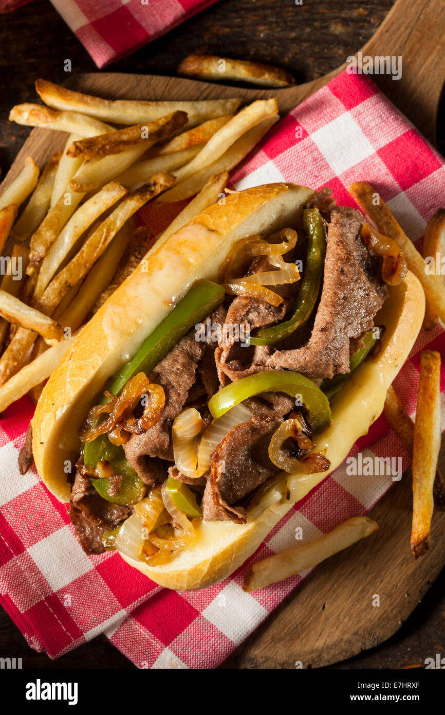 Homemade Philly Cheesesteak Sandwich with Onions and Peppers Stock