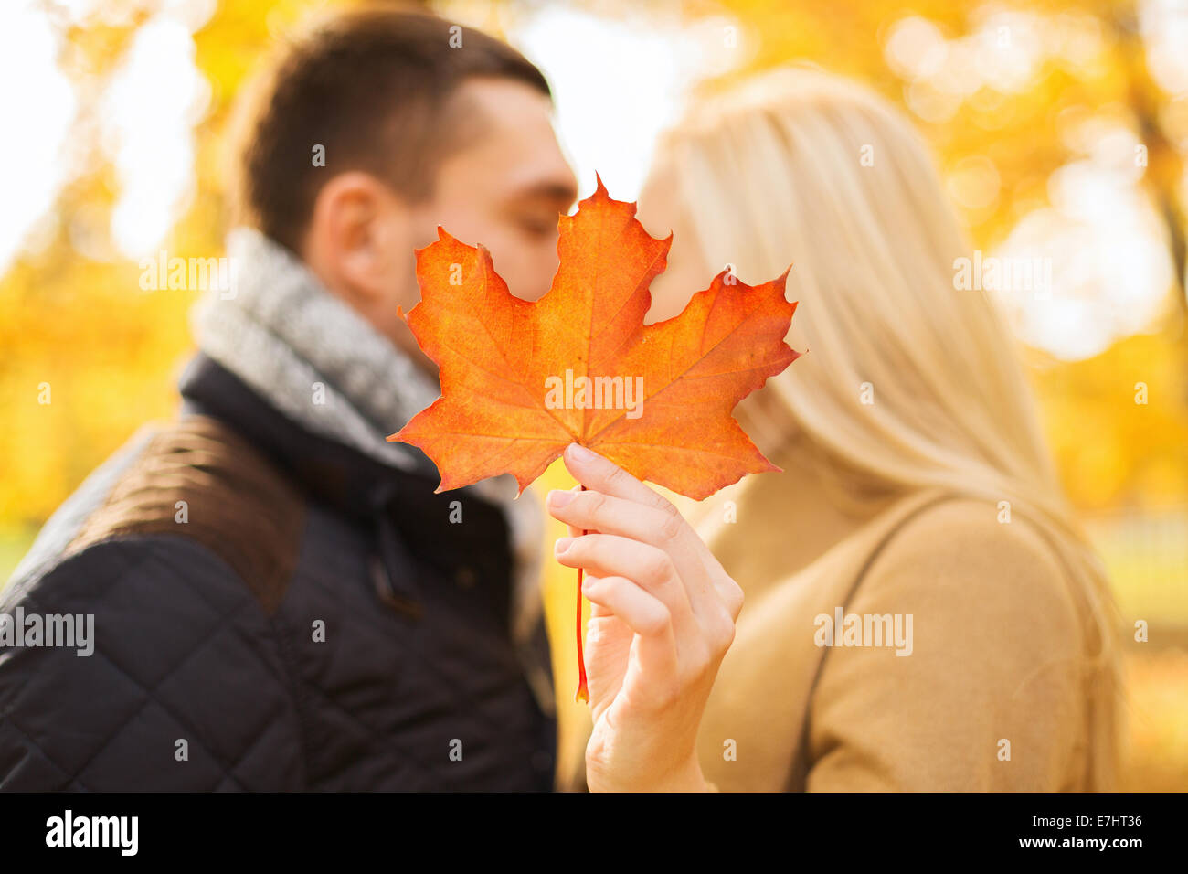 close up of couple kissing in autumn park Stock Photo - Alamy