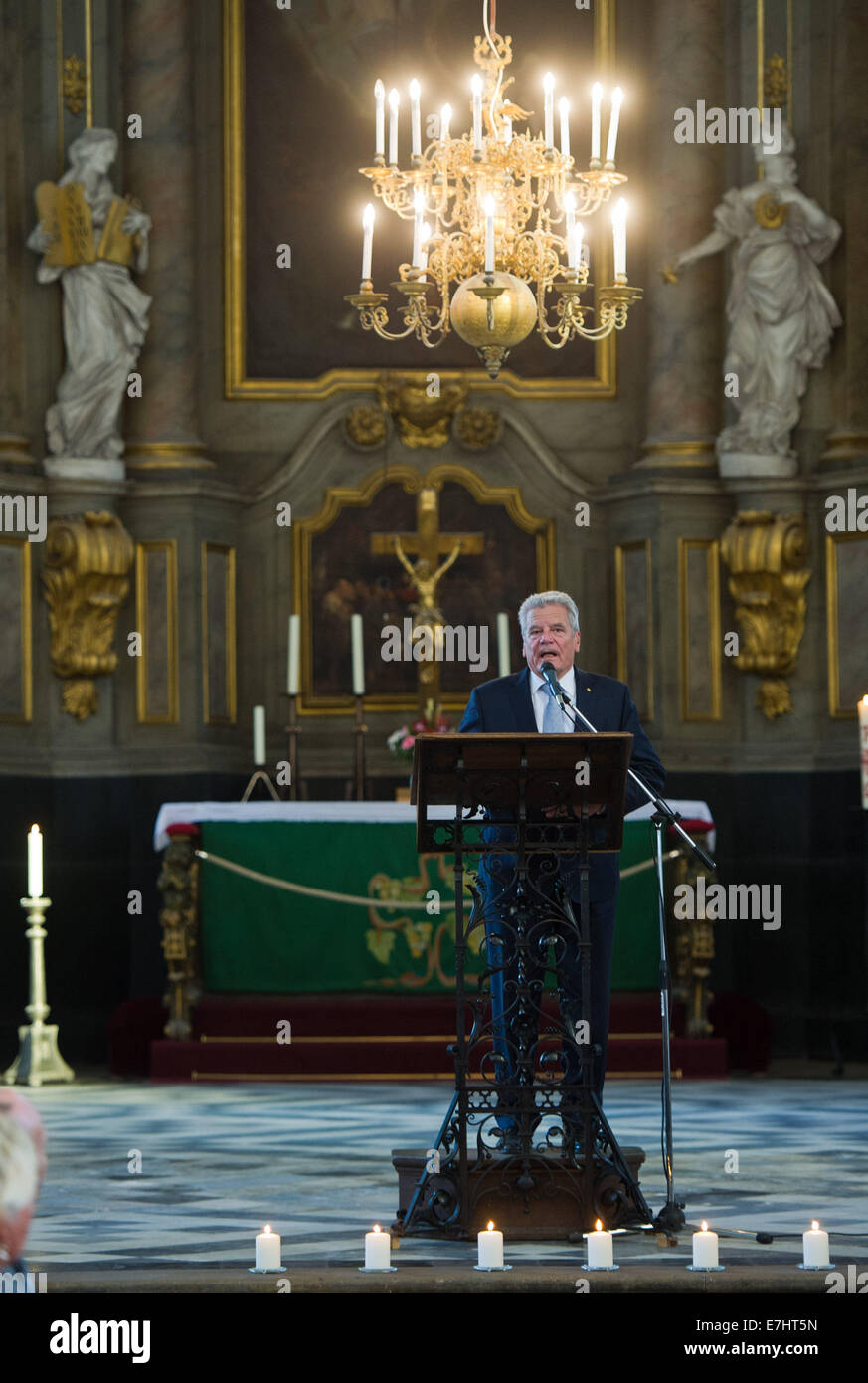 Rostock, Germany. 18th Sep, 2014. German President Joachim Gauck speaks at Saint Mary's Church during the 11th meeting of the German-speaking heads of state in Rostock, Germany, 18 September 2014. They are discussing questions about demographic change and remembering the peaceful revolution in East Germany 25 years ago at the informal meeting. Photo: Stefan Sauer/dpa/Alamy Live News Stock Photo