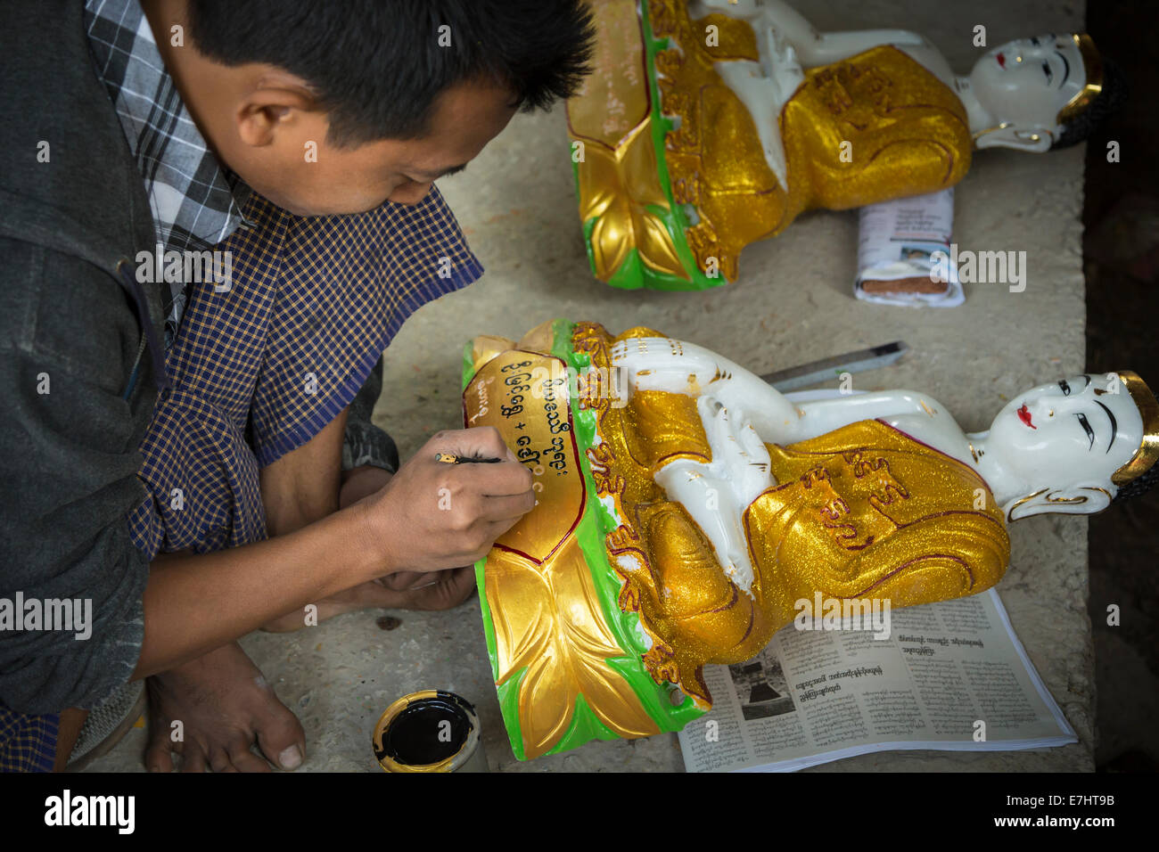 Myanmar (Burma), Mandalay Division, Mandalay, Painting Marble Buddha Statue Stock Photo