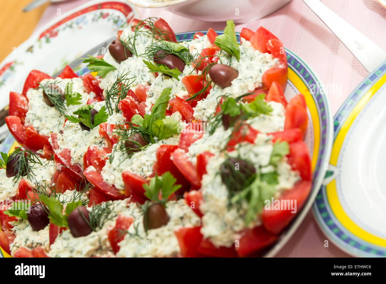 Close-up of stuffed tomatoes with cheese on table Stock Photo
