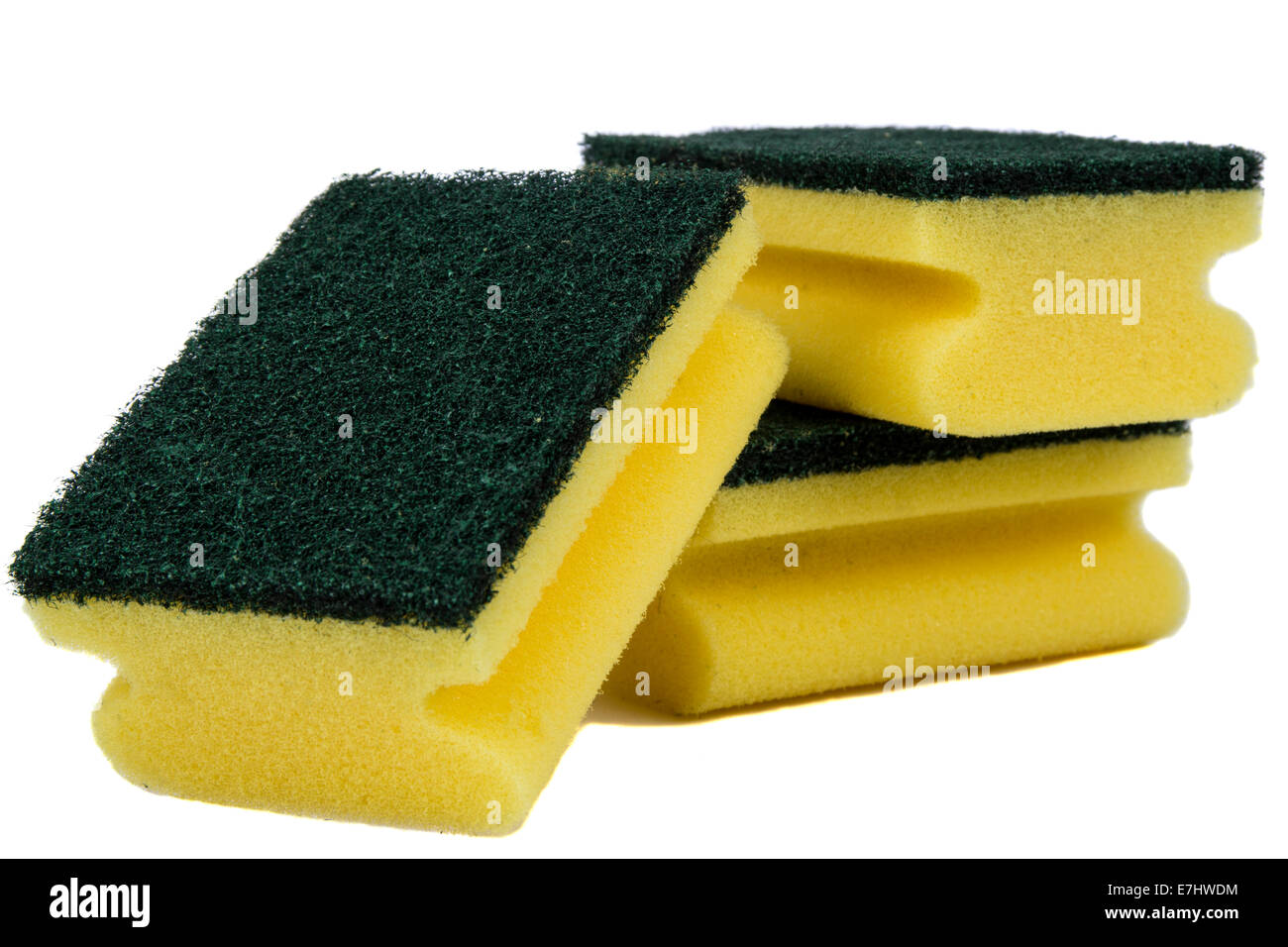 Yellow sponges for washing utensils isolated on a white background Stock Photo