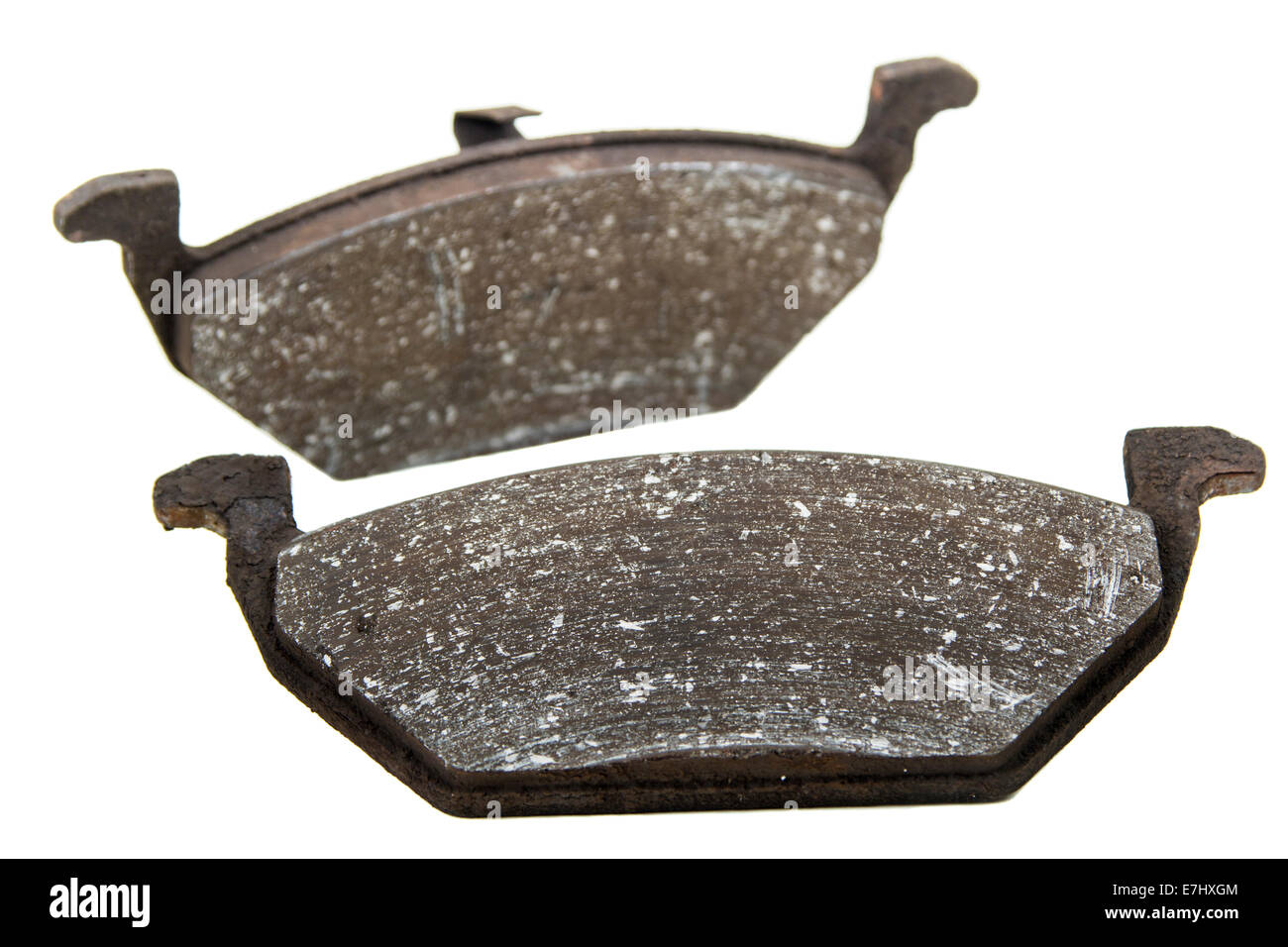 Obsolete car brake pads isolated over white background Stock Photo
