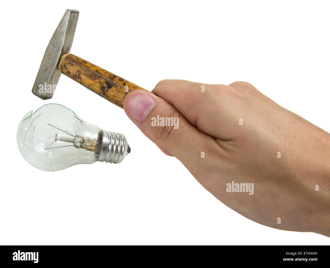 hammer breaking electric bulb isolated over white background Stock Photo