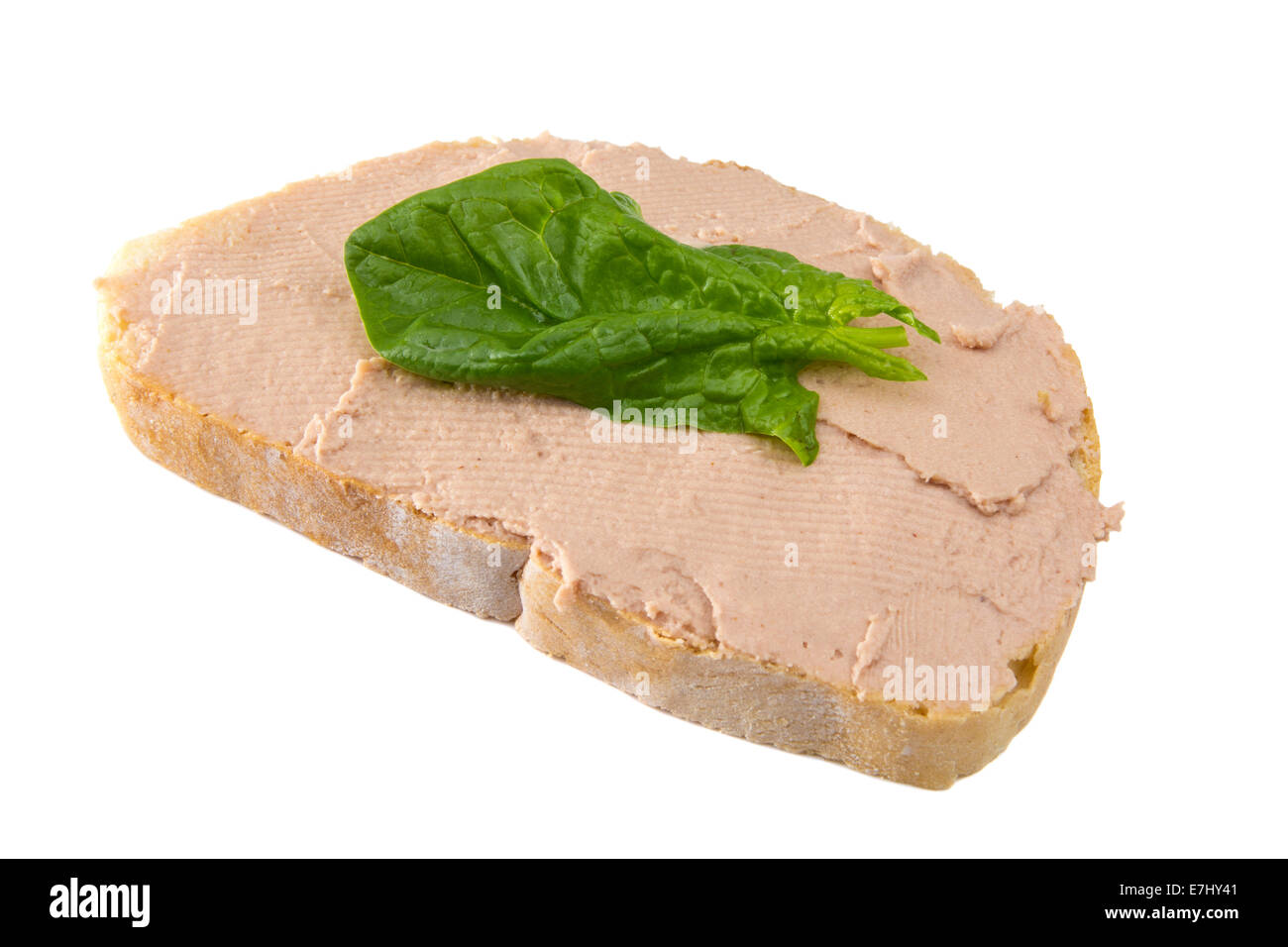 Sandwich with pate and one spinach leaf isolated on white background Stock Photo