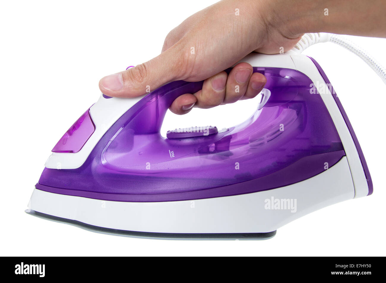 Hand with an electric iron, isolated over white background Stock Photo