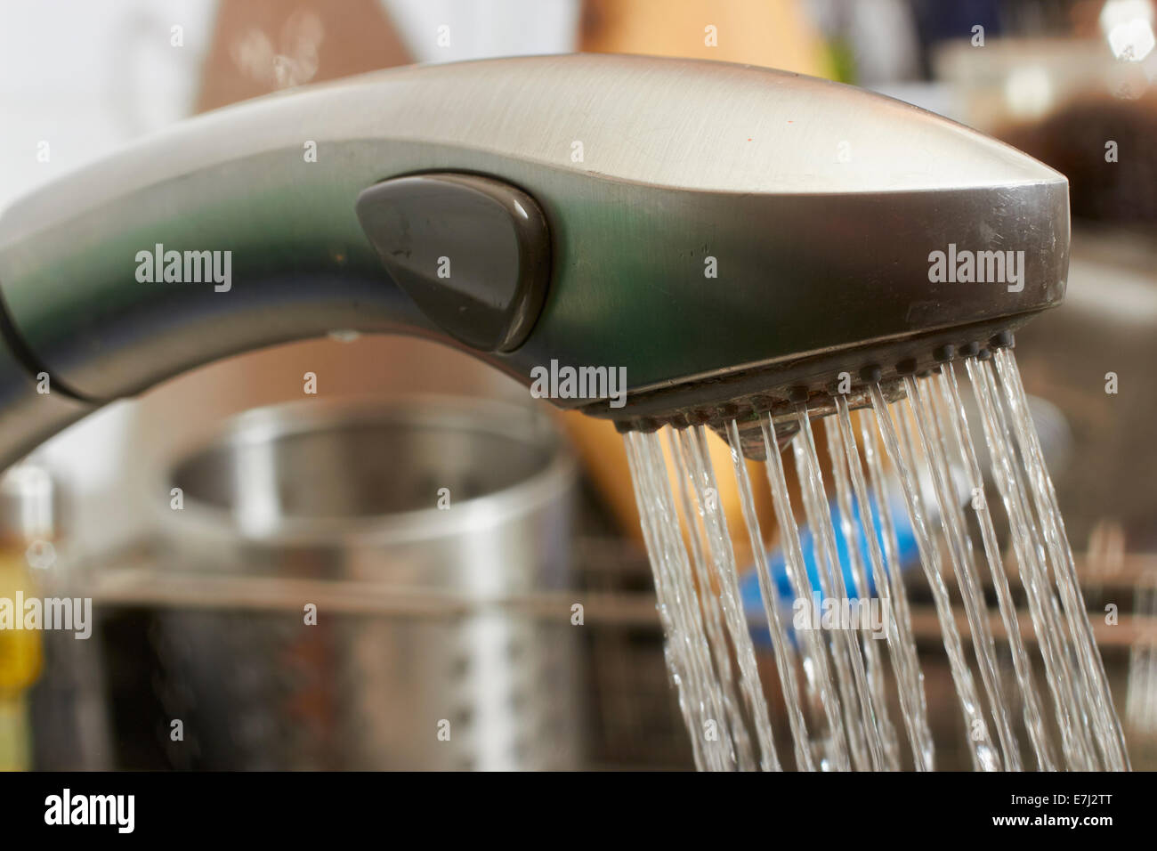 Water running from a kitchen faucet Stock Photo