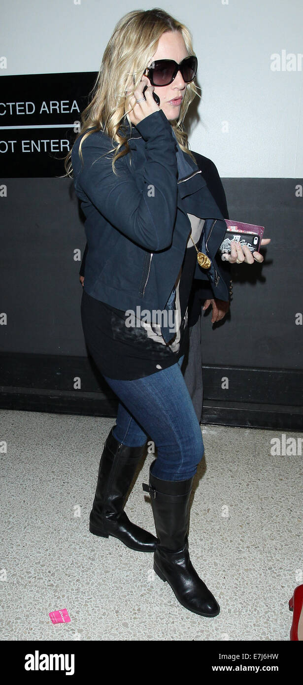 Kate Winslet arrives at Los Angeles International Airport (LAX) talking