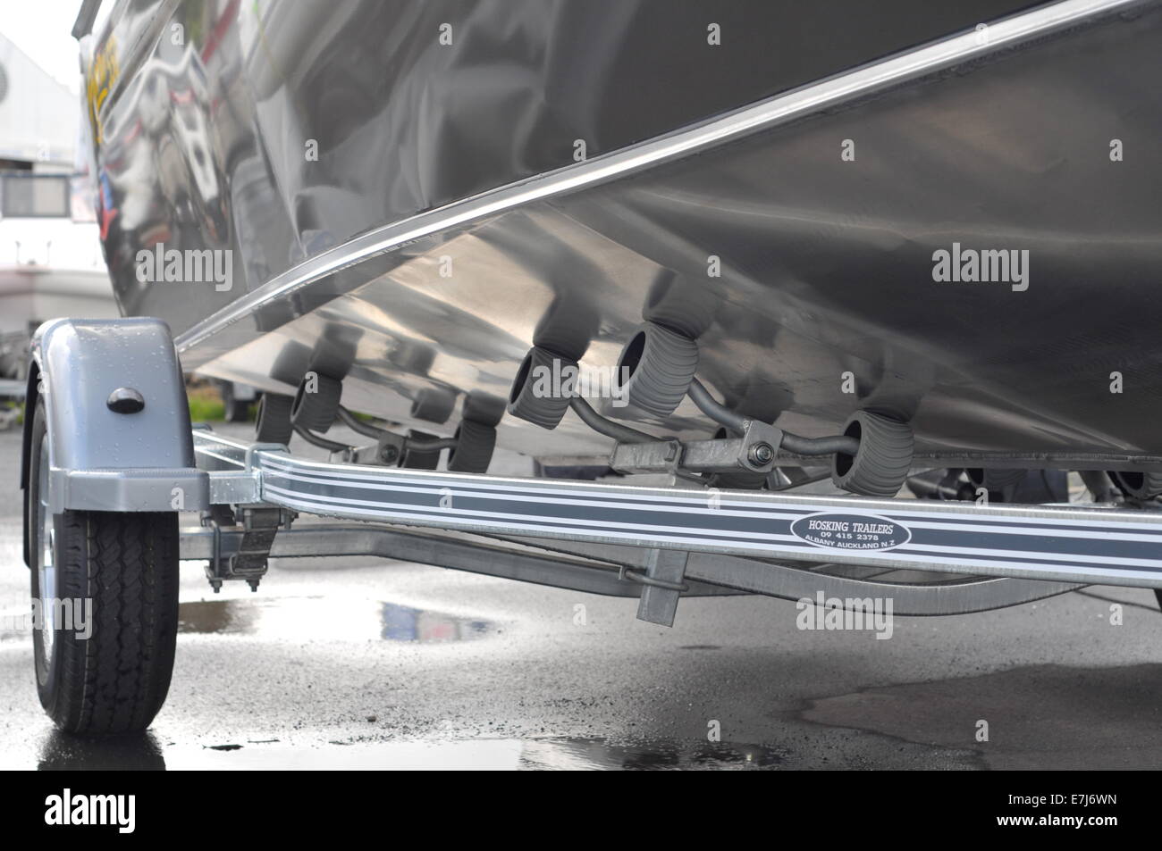 Detail of single axle boat trailer showing frame with suspension and