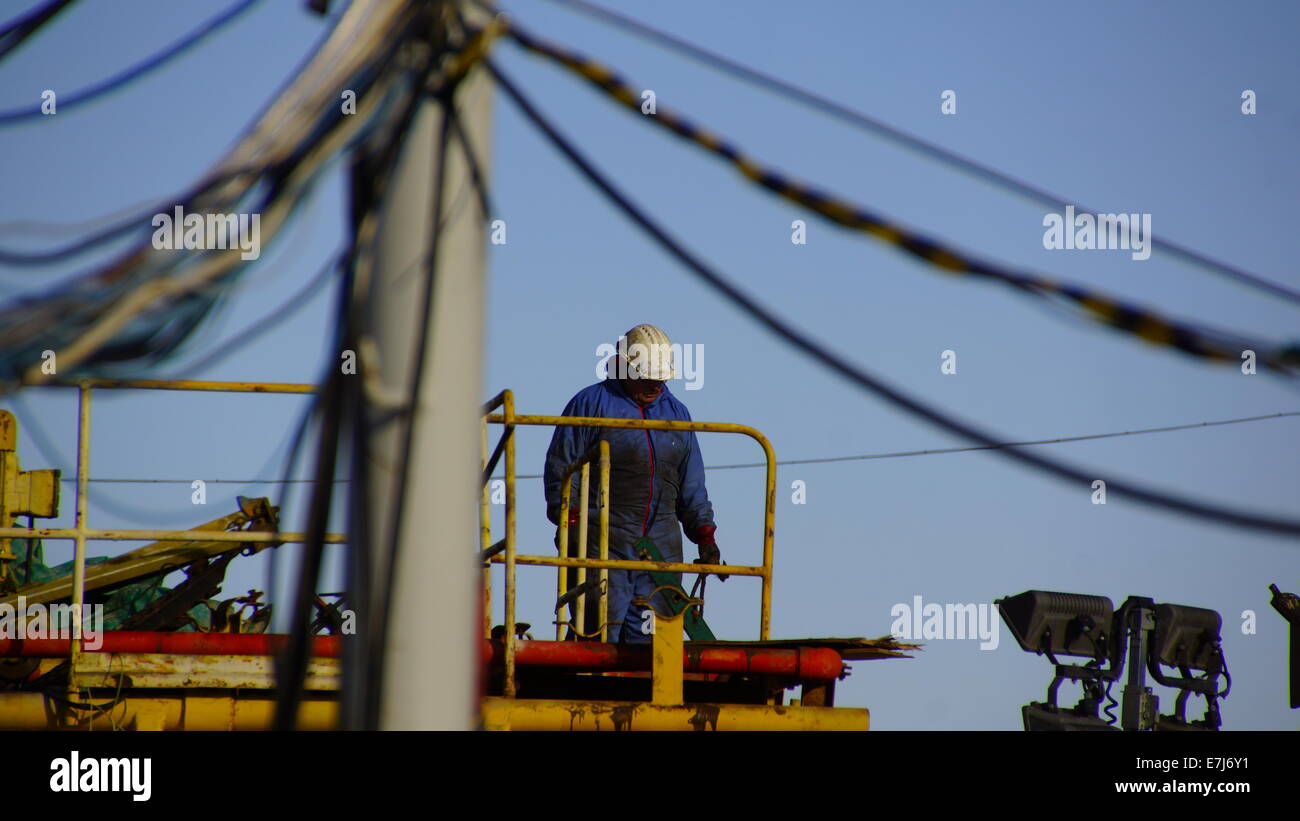 Worker on a oil rig Stock Photo Alamy