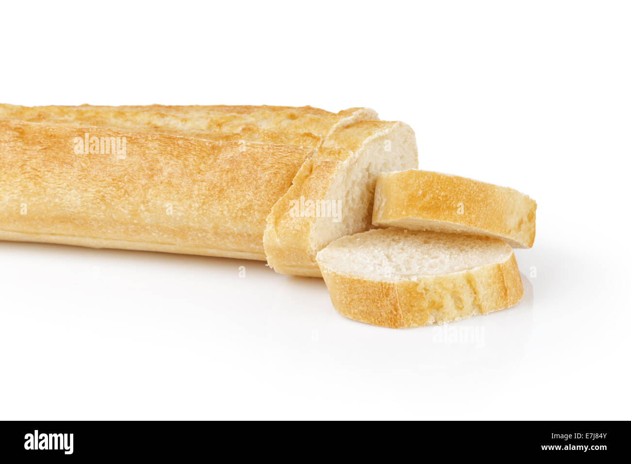 fresh baked baguette with three slices, isolated on white Stock Photo ...