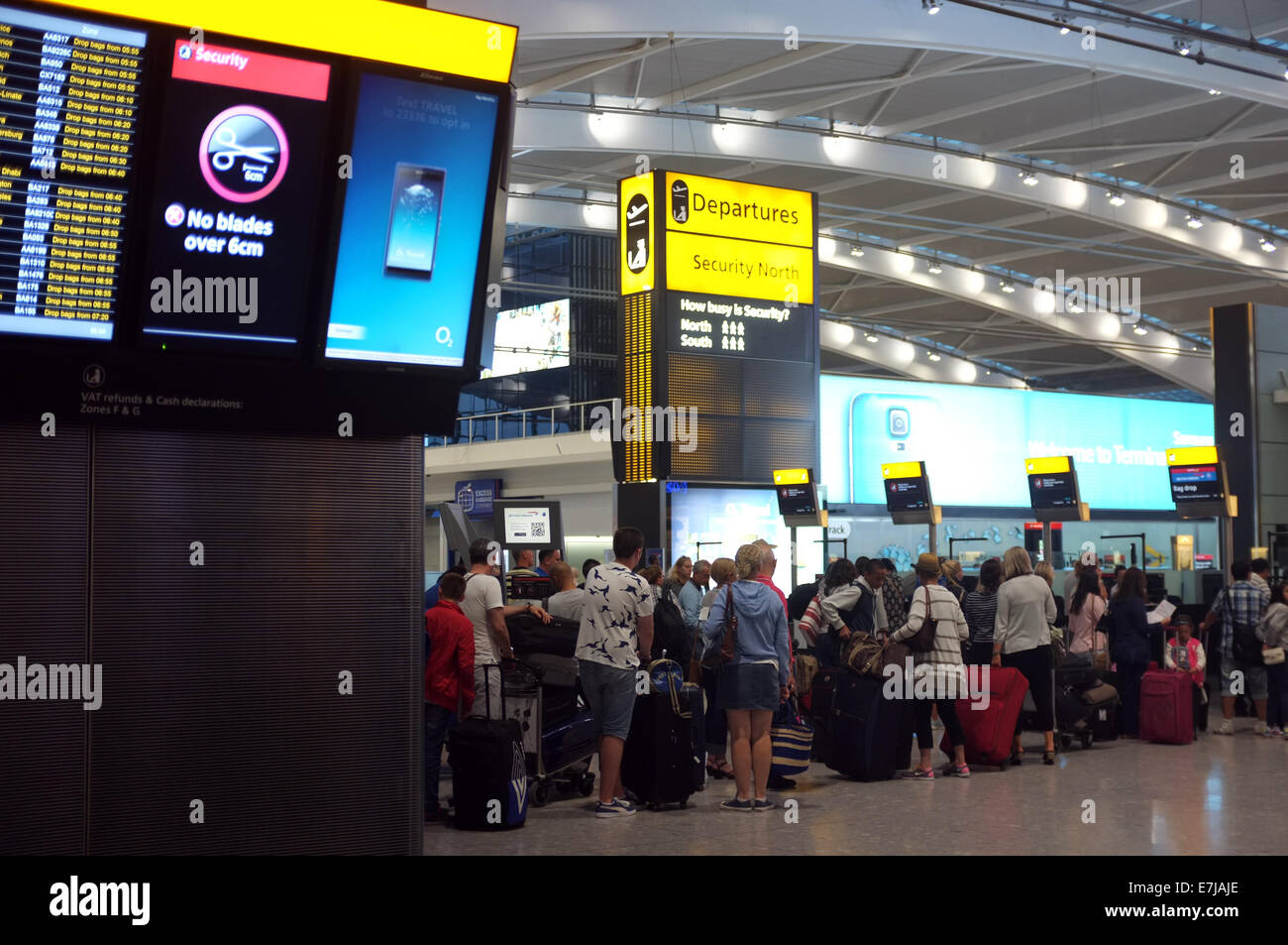 People queuing at the airport Stock Photo