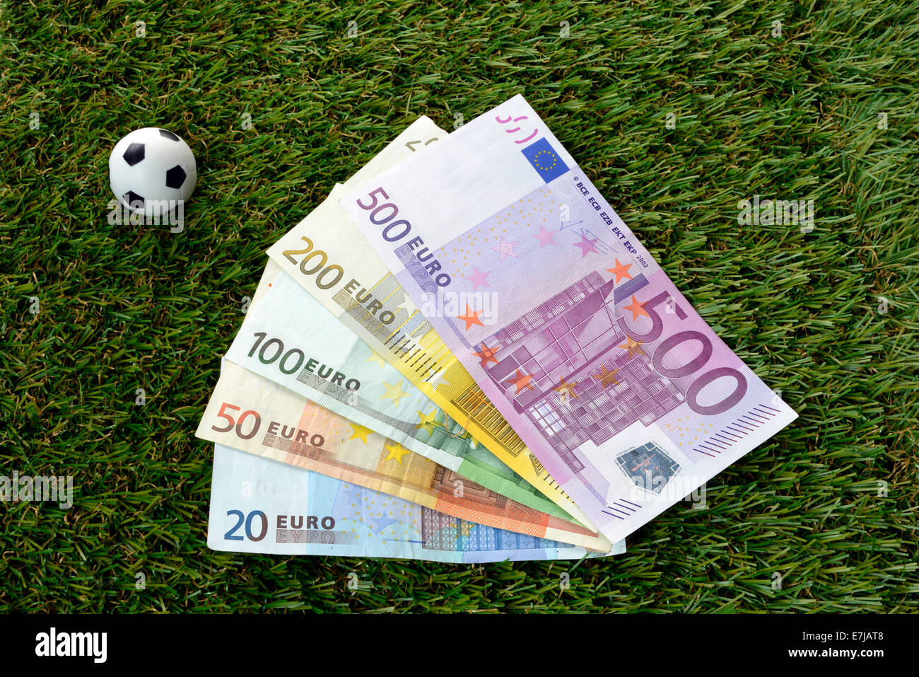 Euro notes, soccer balls Stock Photo