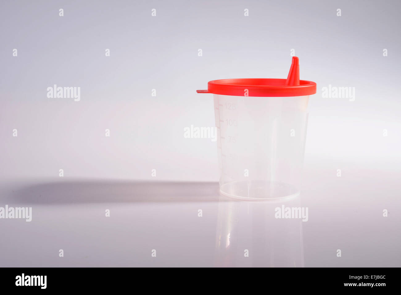 Empty container for urine test Stock Photo