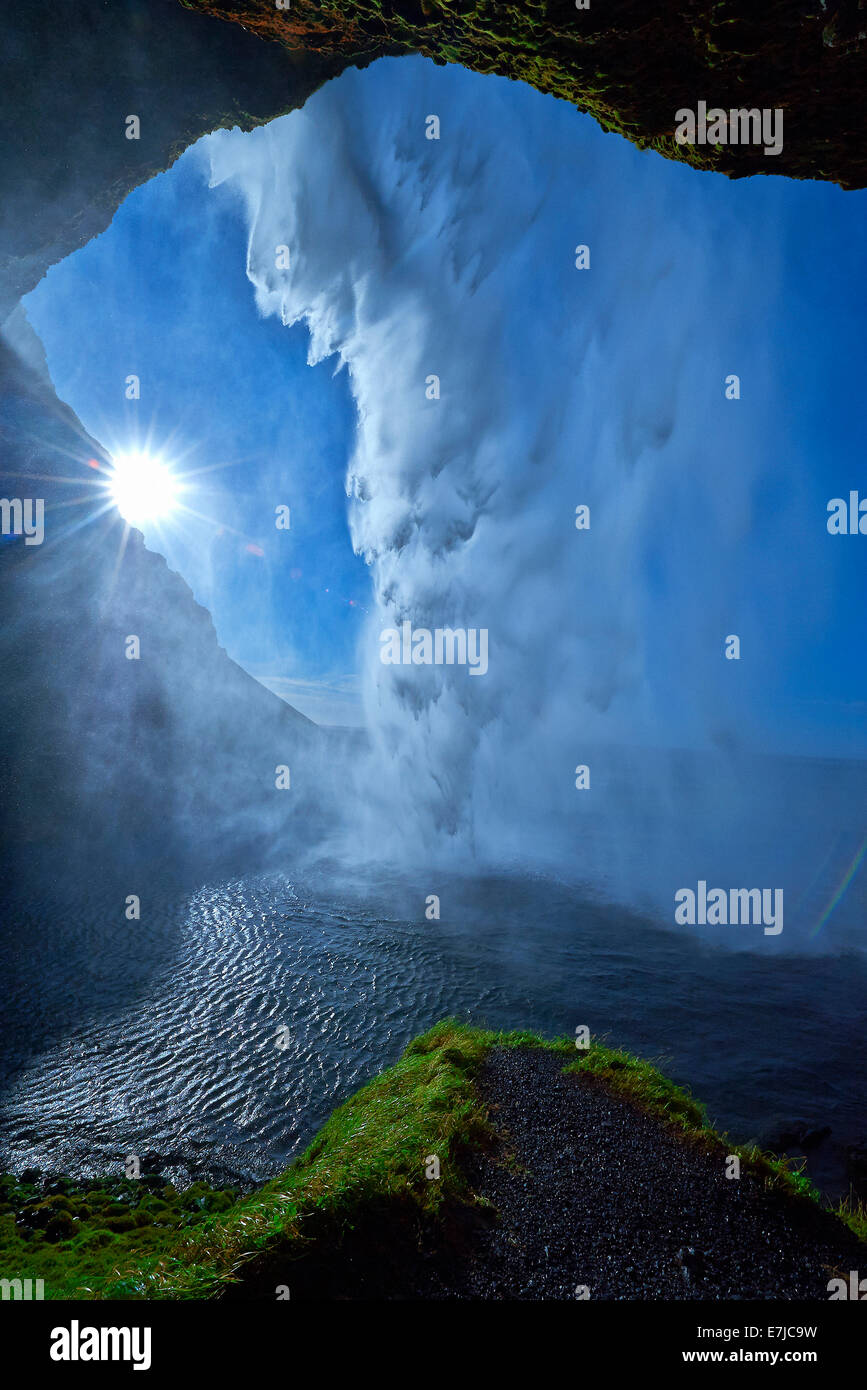 Cliff, back light, grass, Iceland, Seljalandsfoss, waterfall, Europe, holidays, travel, sun, Stock Photo