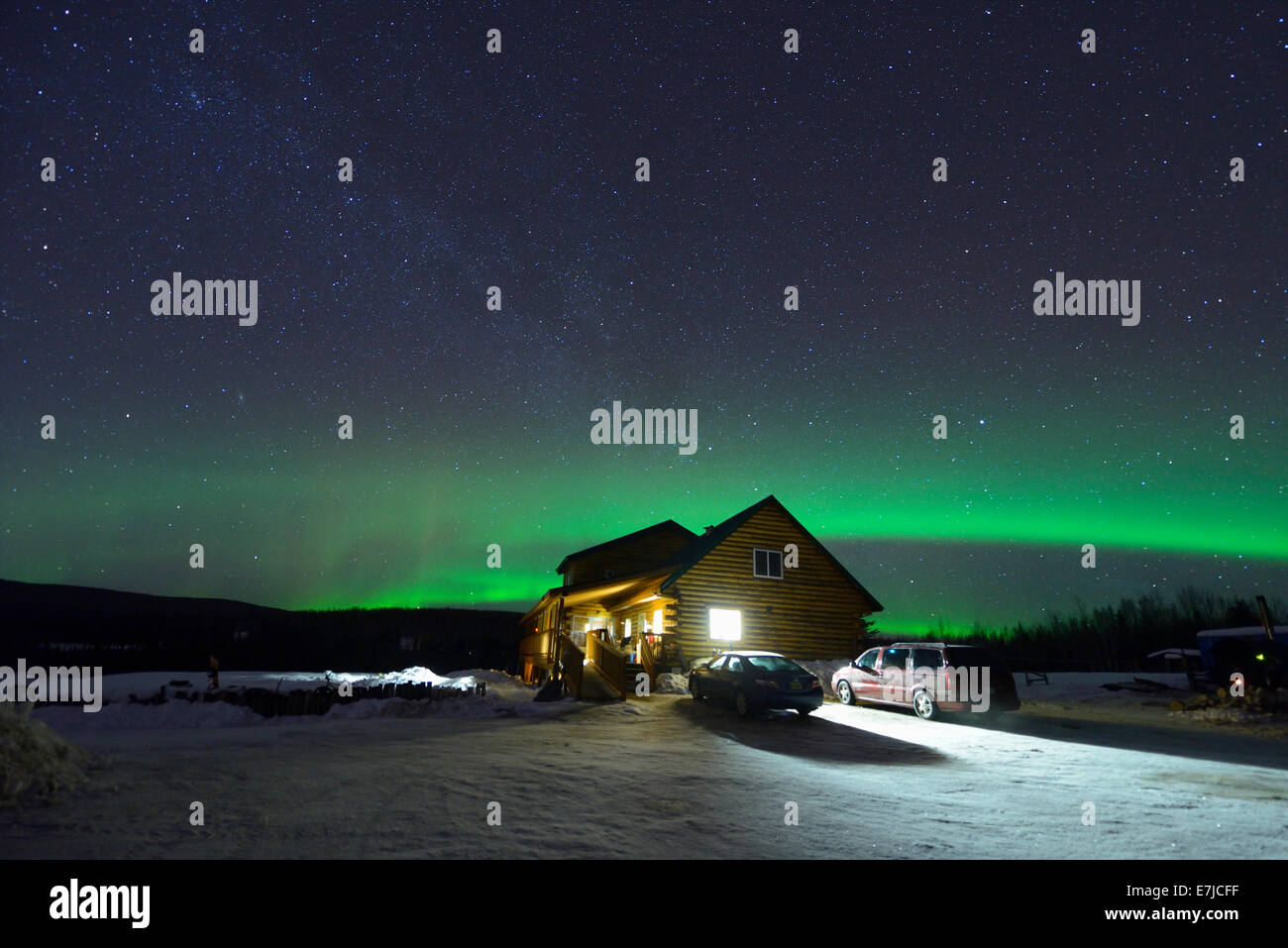 USA, United States, America, Alaska, Fairbanks, astro, stars, aurora borealis, northern lights, house, log, home, night, winter Stock Photo
