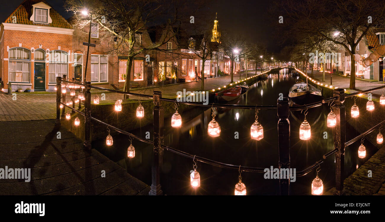 Holland, Europe, Koog aan de Zaan, Enkhuizen, Noord-Holland, Netherlands, city, village, winter, night, evening, floodlight, can Stock Photo