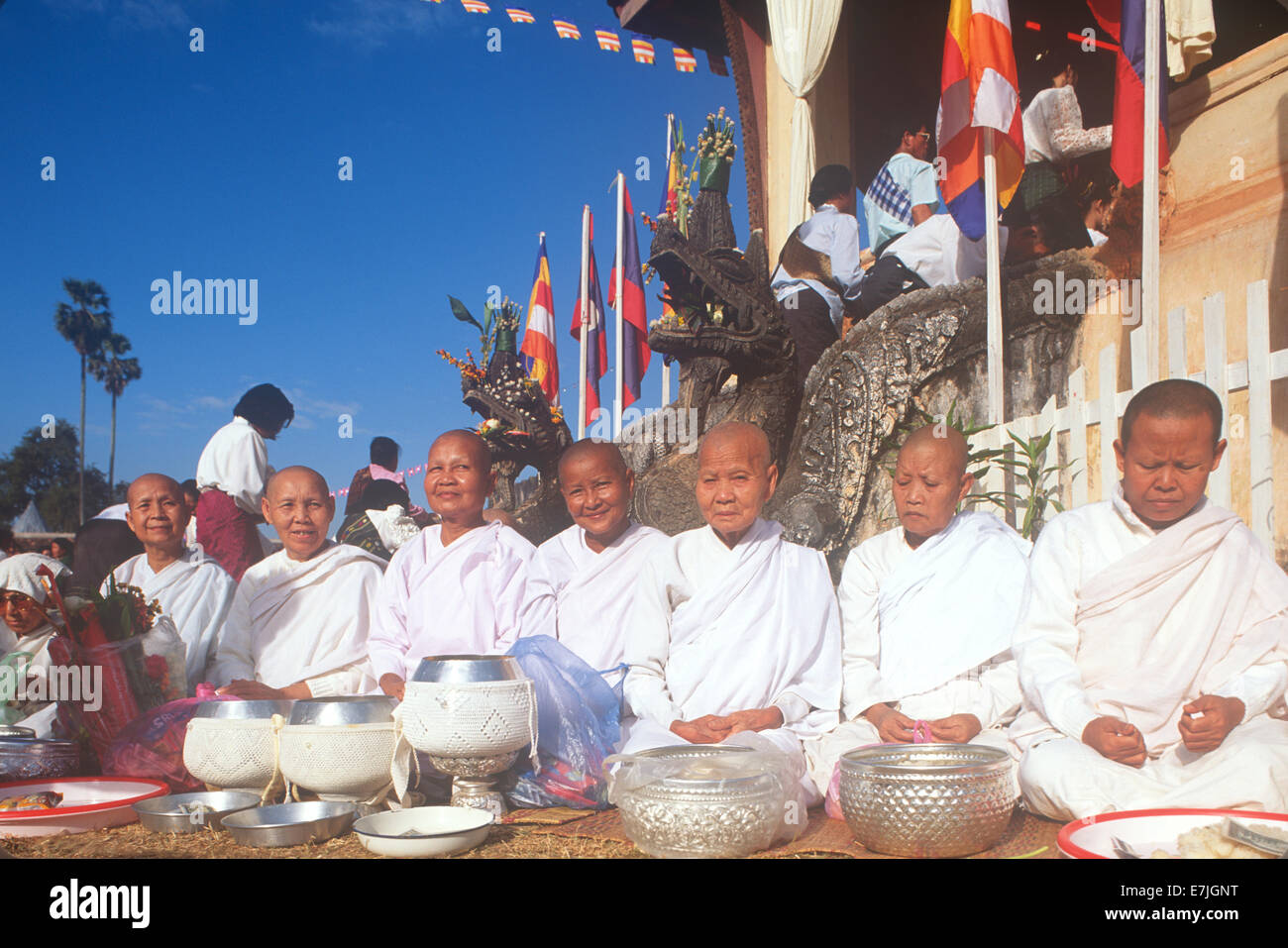 monk, offering, That Luang, Vientiane, Laos, lao, wat that luang, Buddhism, Buddhist, religion, religious, spiritual, southeast Stock Photo