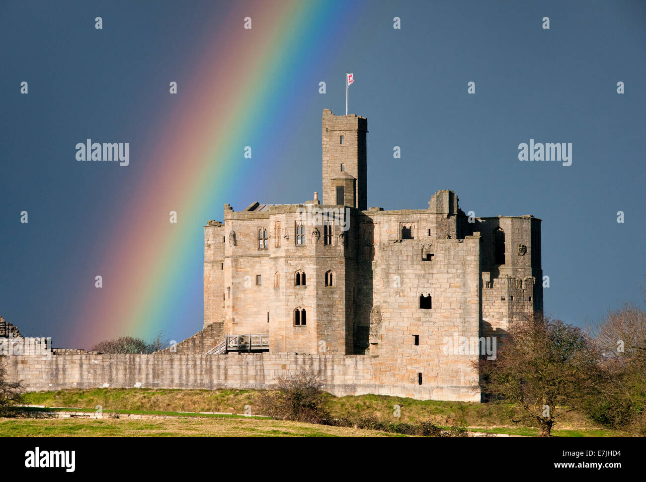 Rainbow Over Warkworth Castle, Warkworth, Northumberland, England, UK Stock Photo