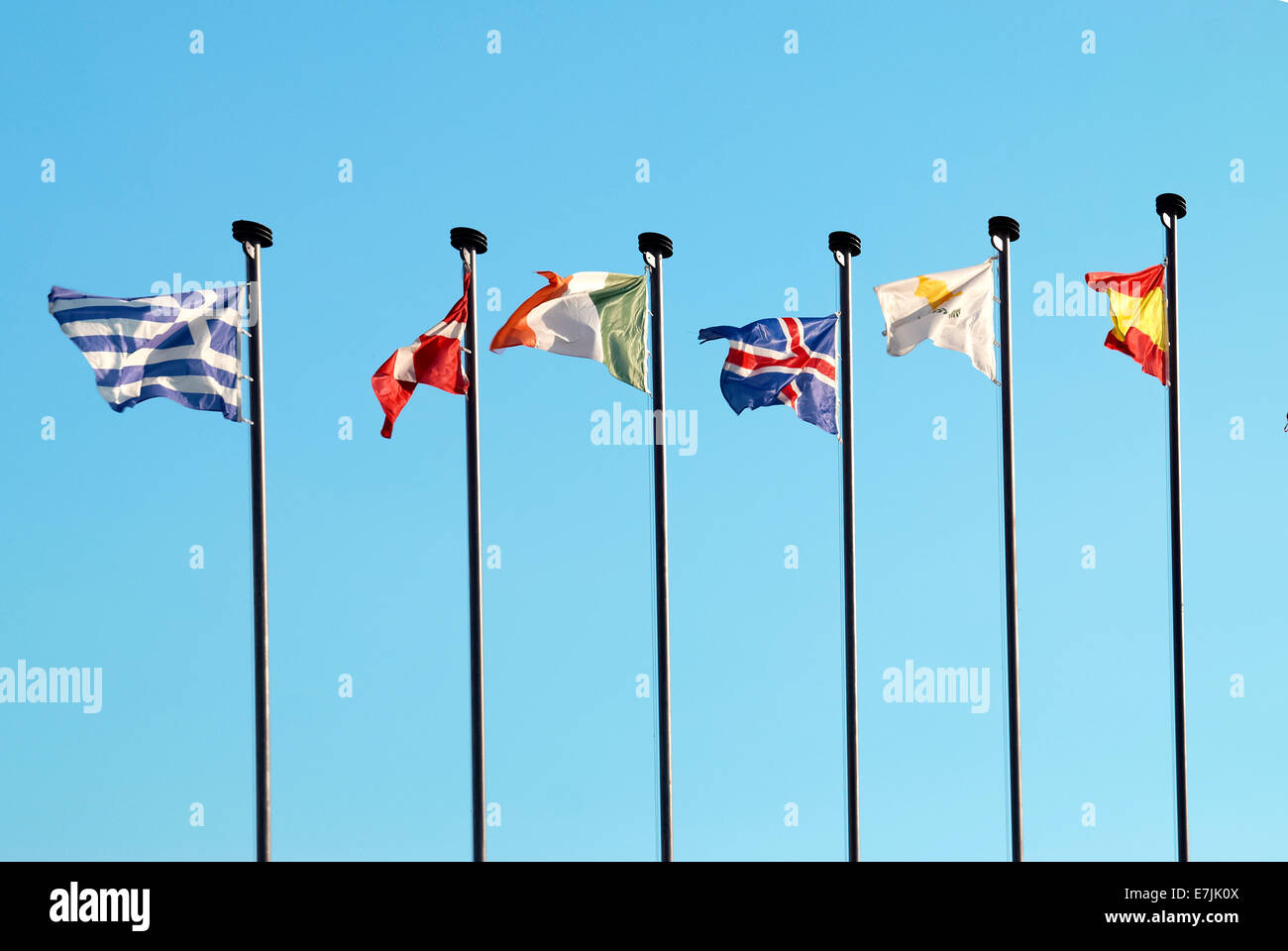 Row of european flags against blue sky background Stock Photo - Alamy