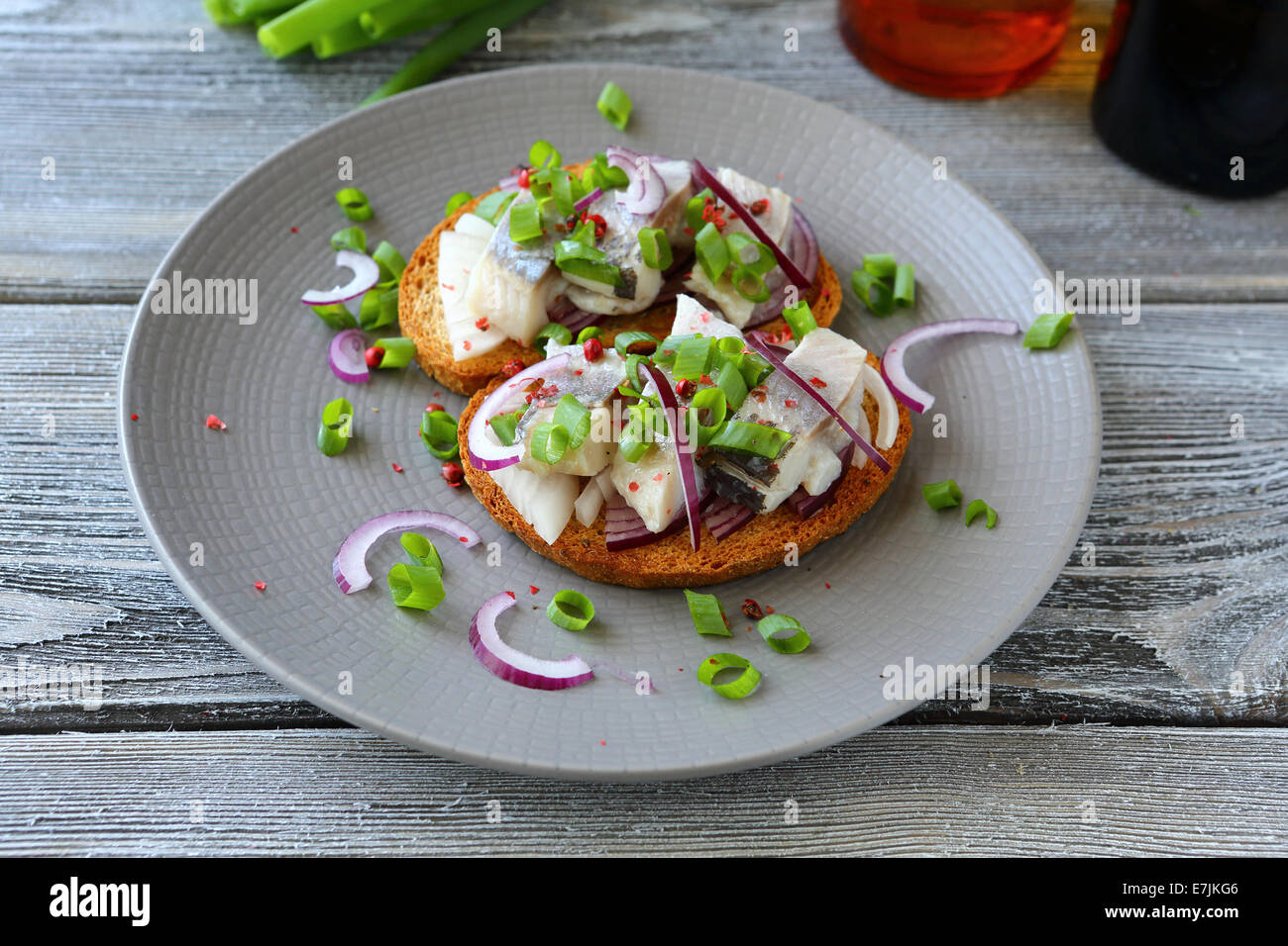canapes with herring and onions, top view Stock Photo Alamy