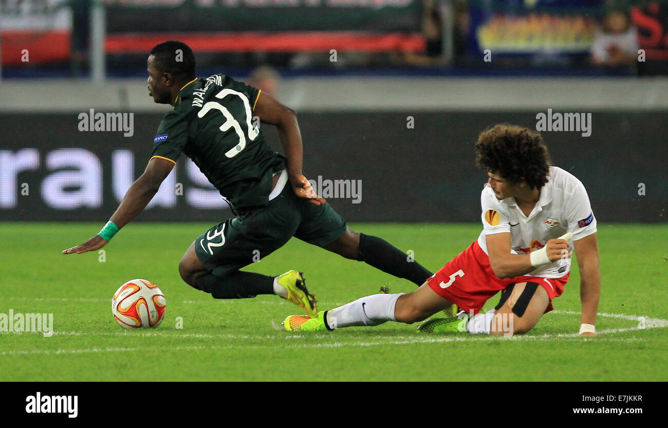 Salzburg, Austria. 18th Sep, 2014.Salzburg's Andre Ramalho (r) vies for the ball with Celtic's Mubarak Wakaso during the Europa League soccer match between Red Bull Salzburg vs FC Celtic Glasgow in Salzburg, Austria, 18 September 2014. Credit:  dpa picture alliance/Alamy Live News Stock Photo