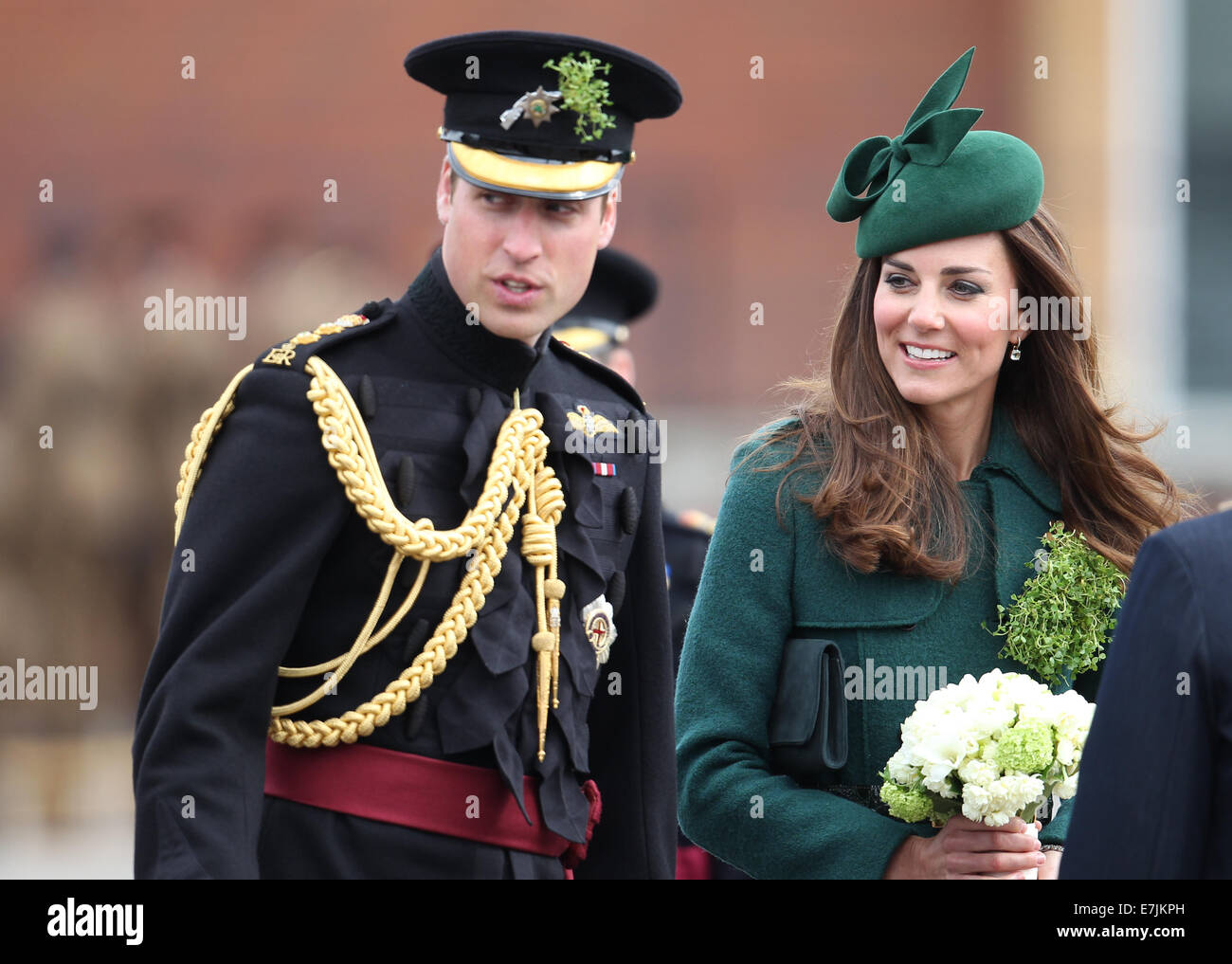 HRH The Duchess of Cambridge and Prince William presents shamrocks to the Irish Guards' at St Patricks Day Parade.  Featuring: Catherine,Duchess of Cambridge,Kate Middleton,Prince William,Duke of Cambridge Where: Aldershot, United Kingdom When: 16 Mar 2014 Stock Photo