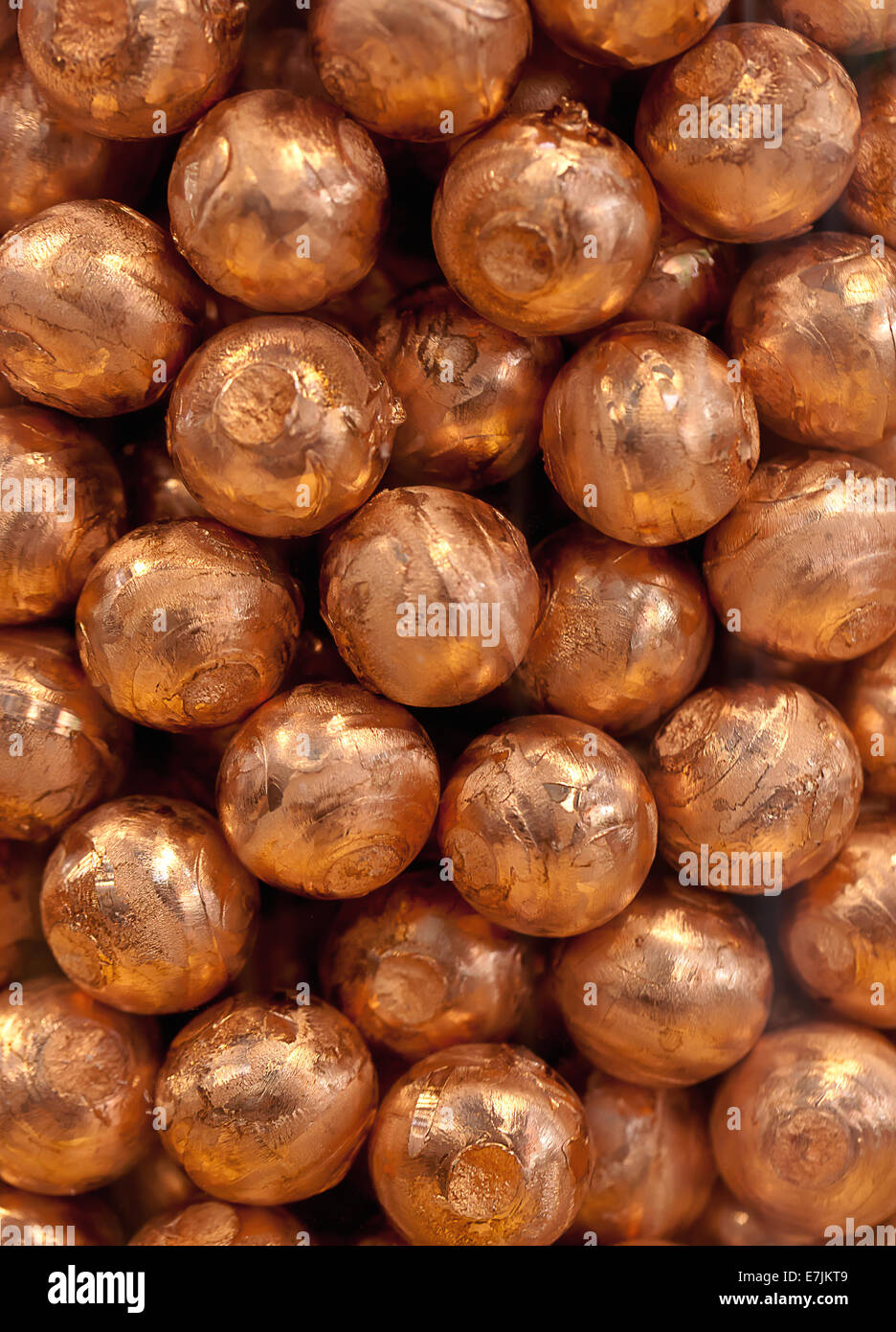 Metal balls in copper bronze Stock Photo - Alamy