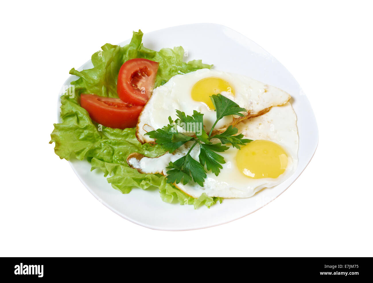 Fried Eggs on a plate .isolated on white background Stock Photo - Alamy