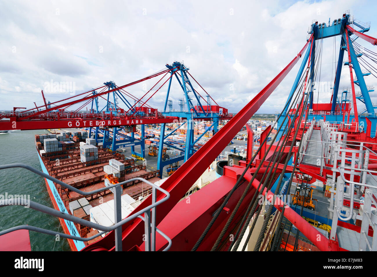 large commercial container port and ships, shot taken from high up on the ship Stock Photo