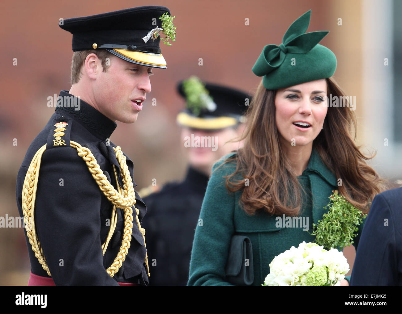 HRH The Duchess of Cambridge and Prince William presents shamrocks to the Irish Guards' at St Patricks Day Parade.  Featuring: Catherine,Duchess of Cambridge,Kate Middleton,Prince William,Duke of Cambridge Where: Aldershot, United Kingdom When: 16 Mar 2014 Stock Photo