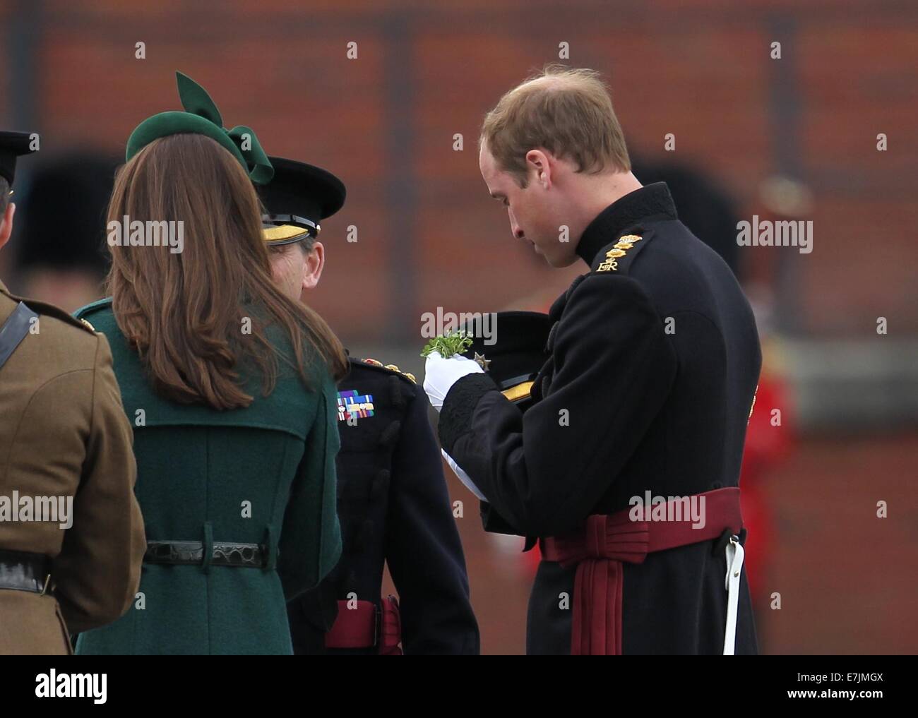 HRH The Duchess of Cambridge and Prince William presents shamrocks to the Irish Guards' at St Patricks Day Parade.  Featuring: Catherine,Duchess of Cambridge,Kate Middleton,Prince William,Duke of Cambridge Where: Aldershot, United Kingdom When: 16 Mar 2014 Stock Photo