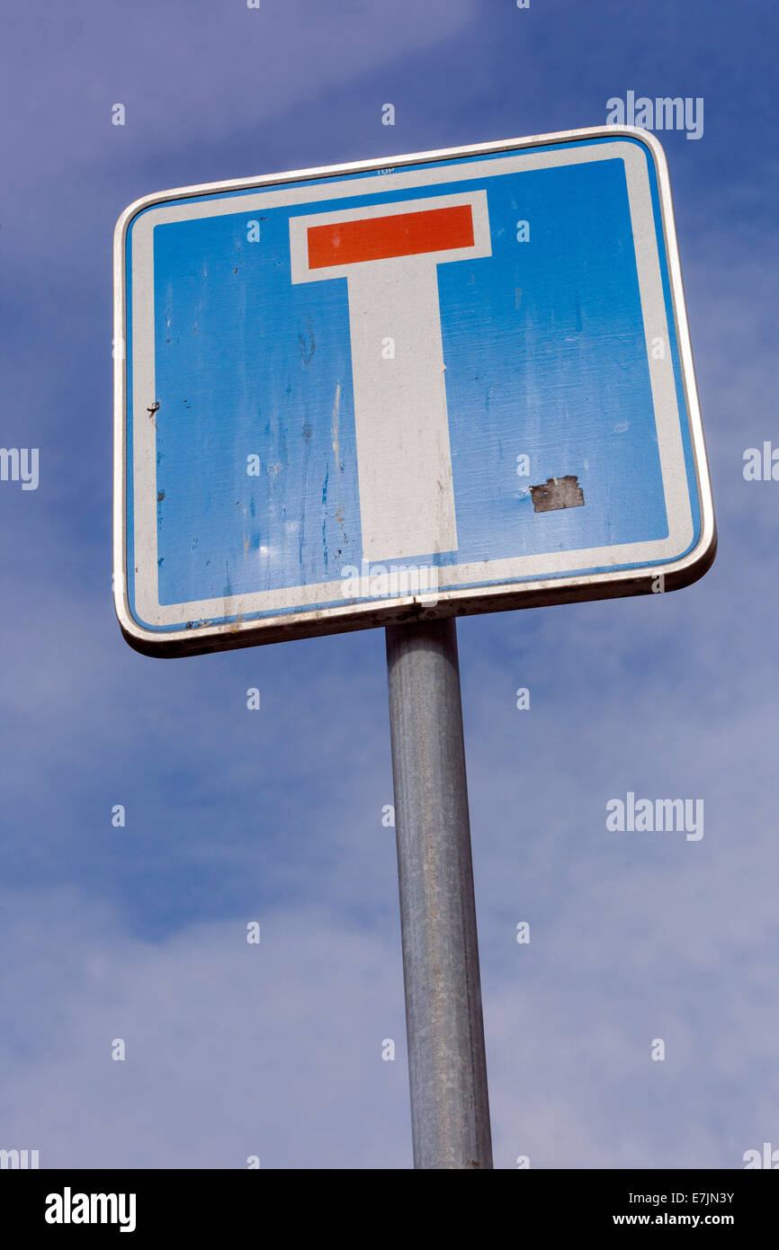 Dead-end sign against a blue sky Stock Photo