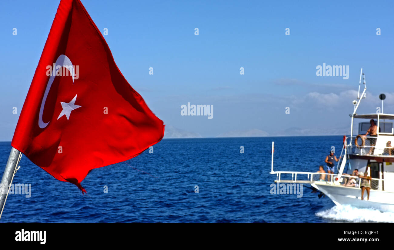 Turkish flag with a passenger boat Stock Photo
