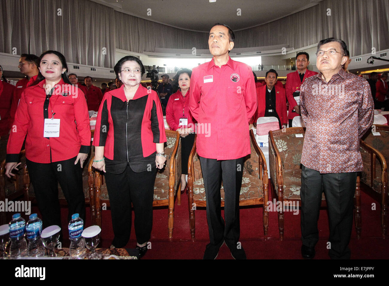 Semarang, Indonesia. 19th September, 2014. From Left, chairman of PDI-P party who also the daughter of Megawati, Puan Maharani, Former president and chairperson of Indonesian Democratic Party of Struggle (PDI-P) Megawati Sukarnoputri, Indonesian president-elect Joko Widodo and Vice president-elect Jusuf Kalla attend the 4th national working meeting of PDI-P at Marina Convention Hall in Semarang, Central Java, Indonesia. The national meeting attended by 1,590 party cadres from all over Indonesia and take place from 19-21 September 2014. Credit:  PACIFIC PRESS/Alamy Live News Stock Photo