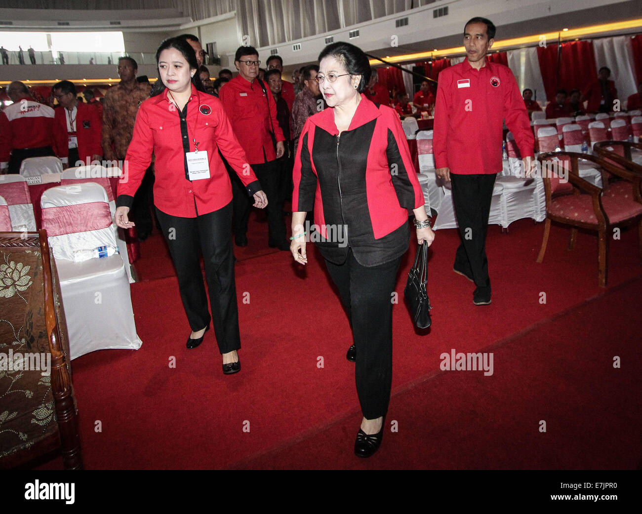 Semarang, Indonesia. 19th September, 2014. From Right, Indonesian president-elect Joko Widodo, Former president and chairperson of Indonesian Democratic Party of Struggle (PDI-P) Megawati Sukarnoputri and chairman of PDI-P party who also the daughter of Megawati, Puan Maharani attend the 4th national working meeting of PDI-P at Marina Convention Hall in Semarang, Central Java, Indonesia. The national meeting attended by 1,590 party cadres from all over Indonesia and take place from 19-21 September 2014. Credit:  PACIFIC PRESS/Alamy Live News Stock Photo