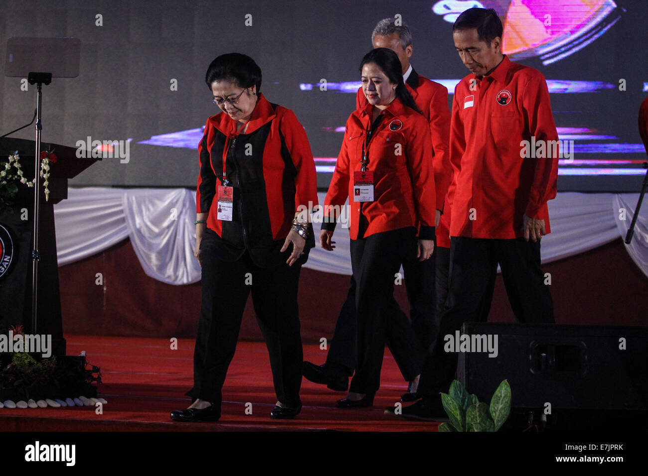 Semarang, Indonesia. 19th September, 2014. Former president and chairperson of Indonesian Democratic Party of Struggle (PDI-P) Megawati Sukarnoputri, chairman of PDI-P party who also the daughter of Megawati, Puan Maharani, and Indonesian president-elect Joko Widodo after opening ceremony the 4th national working meeting of PDI-P at Marina Convention Hall in Semarang, Central Java, Indonesia. The national meeting attended by 1,590 party cadres from all over Indonesia and take place from 19-21 September 2014. Credit:  PACIFIC PRESS/Alamy Live News Stock Photo