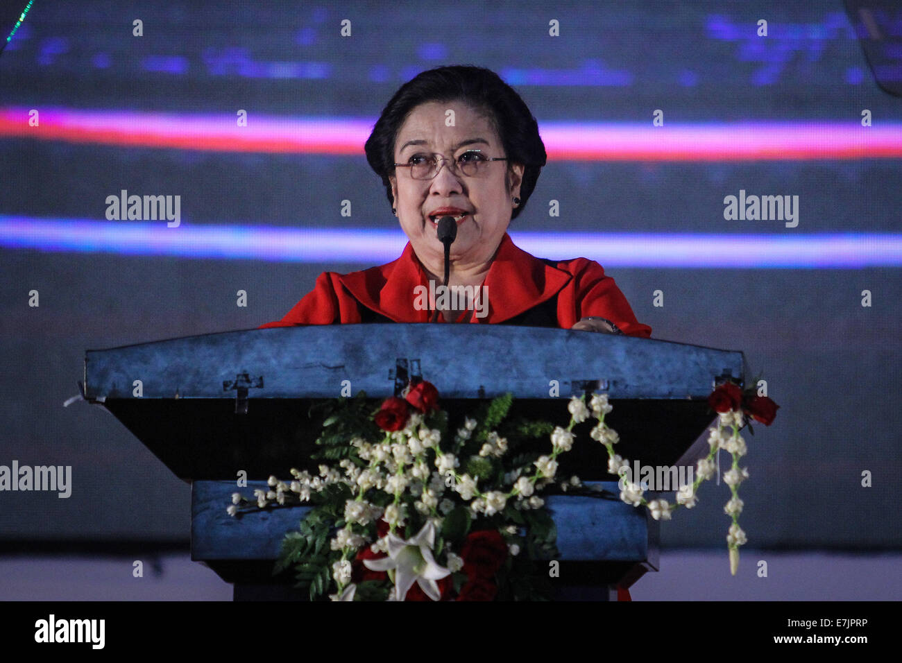 Semarang, Indonesia. 19th September, 2014. Former president and chairperson of Indonesian Democratic Party of Struggle (PDI-P) Megawati Sukarnoputri gestures as she delivers her speech during the 4th national working meeting of PDI-P at Marina Convention Hall in Semarang, Central Java, Indonesia. The national meeting attended by 1,590 party cadres from all over Indonesia and take place from 19-21 September 2014. The meeting is expected to change the 10-year mindset of the PDI-P, as it has switched to being the ruling party from being the opposition party. Credit:  PACIFIC PRESS/Alamy Live News Stock Photo