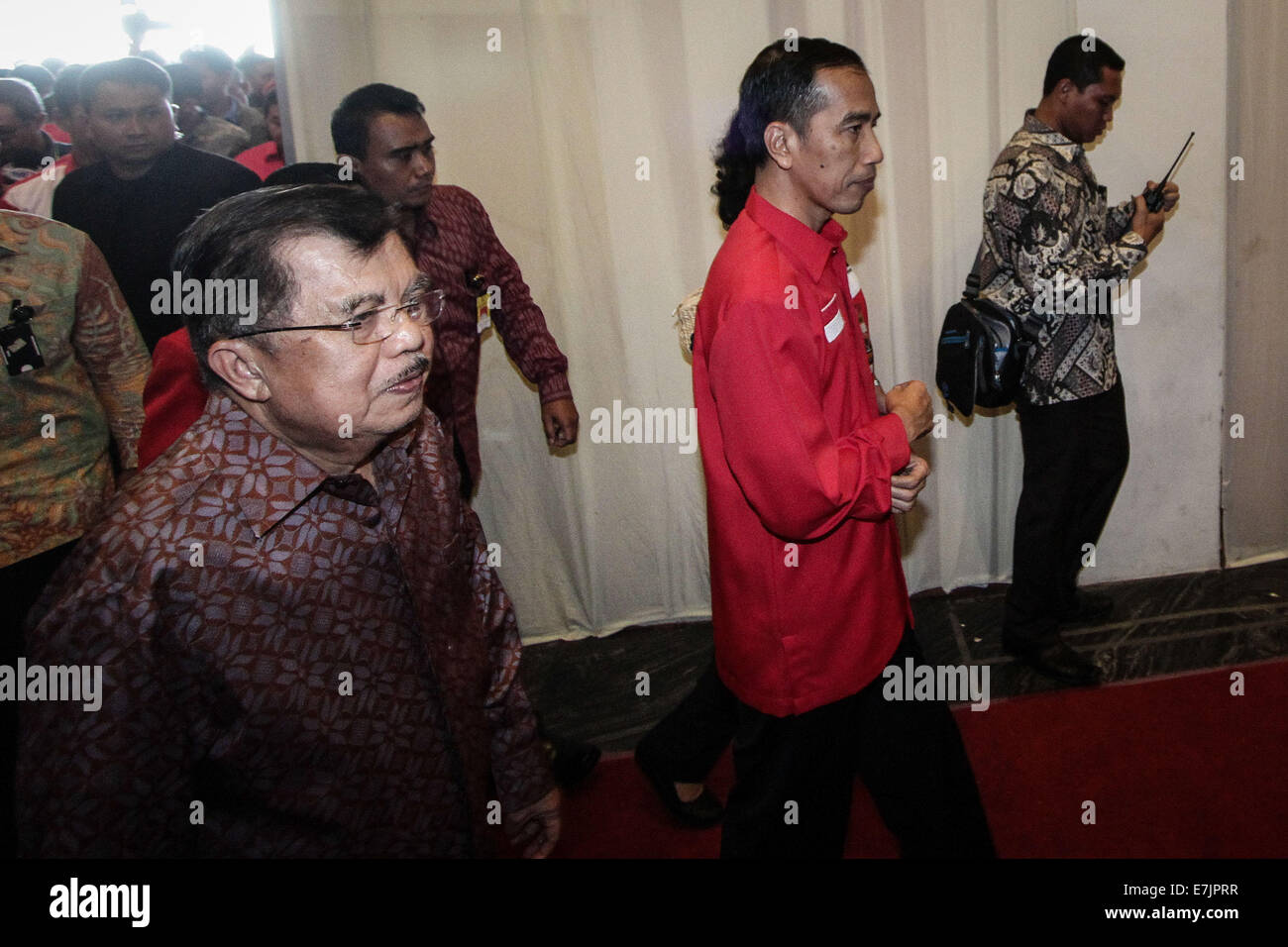 Semarang, Indonesia. 19th September, 2014. Indonesian president-elect Joko Widodo and Vice president-elect Jusuf Kalla (L) attend attend the 4th national working meeting of PDI-P at Marina Convention Hall in Semarang, Central Java, Indonesia. The national meeting attended by 1,590 party cadres from all over Indonesia and take place from 19-21 September 2014. The meeting is expected to change the 10-year mindset of the PDI-P, as it has switched to being the ruling party from being the opposition party. Credit:  PACIFIC PRESS/Alamy Live News Stock Photo