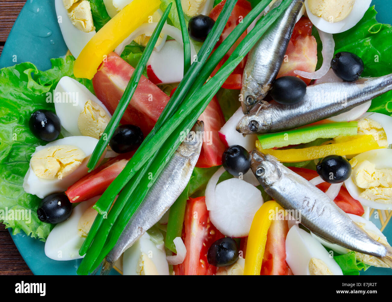 Nicoise Salad with anchovies composed salad of tomatoes, tuna, hard