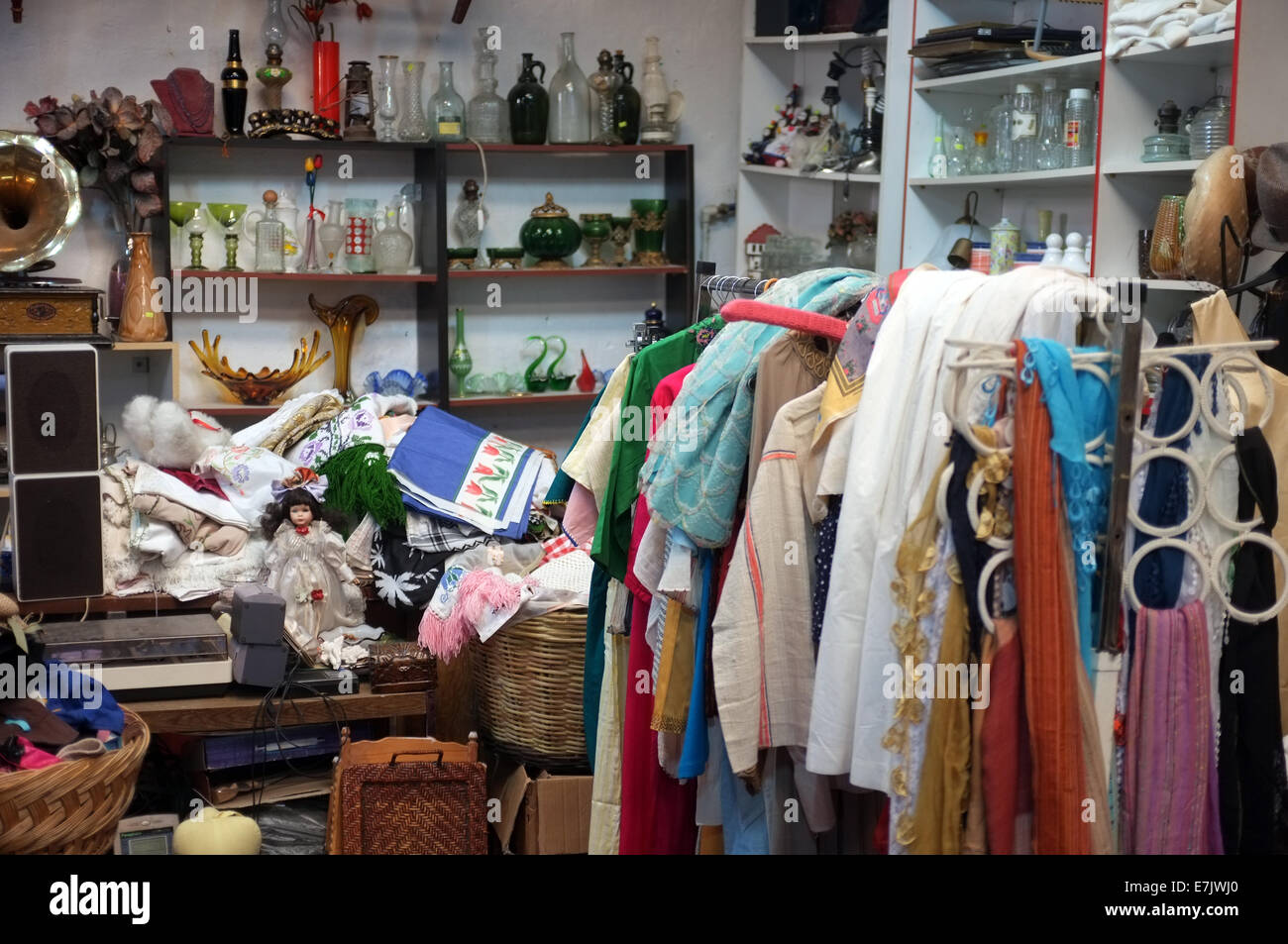 Used goods for sale indoor market Stock Photo Alamy