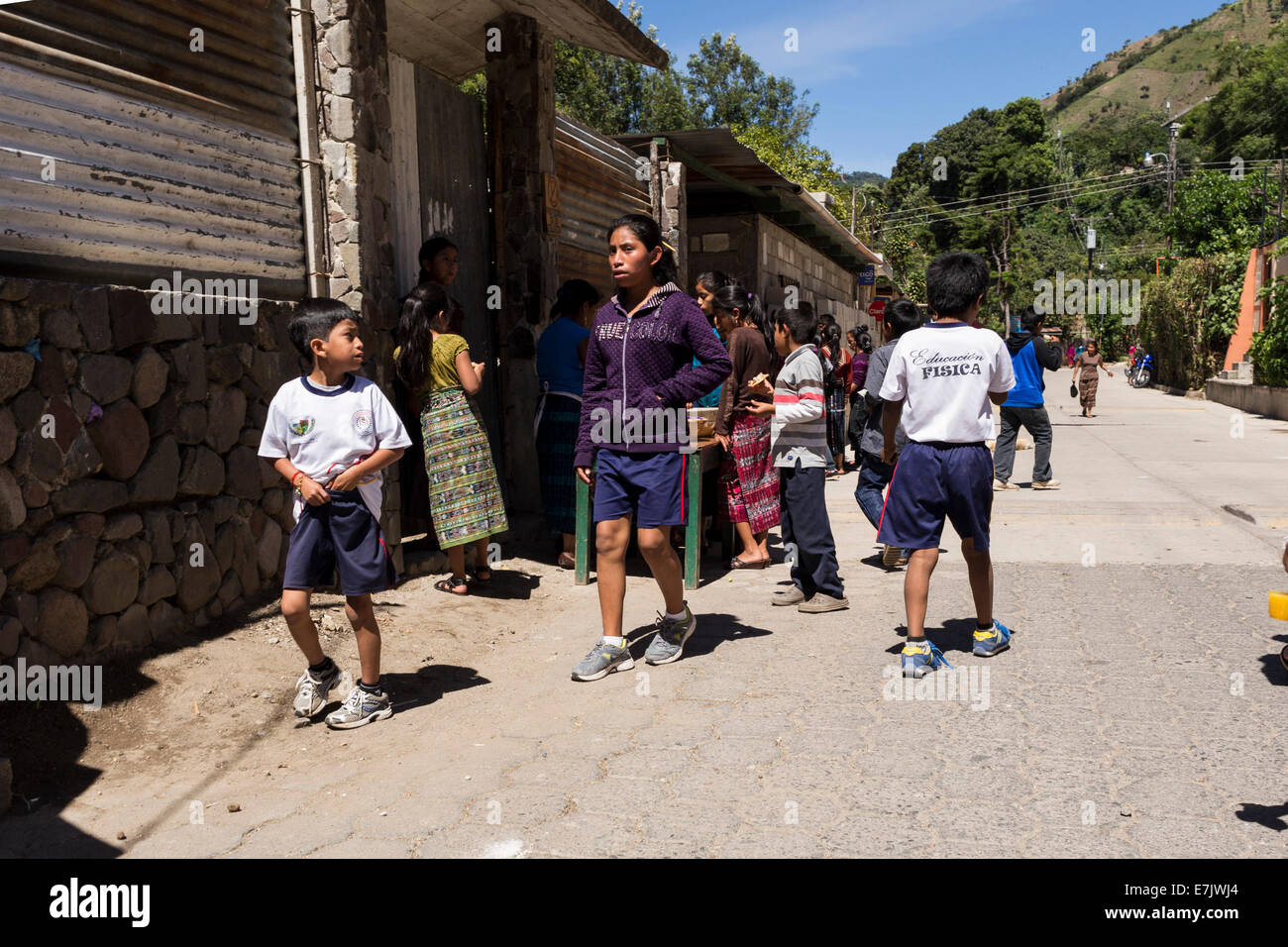 Children having lunch after school in San Marcos la Laguna, Solola, Guatemala Stock Photo