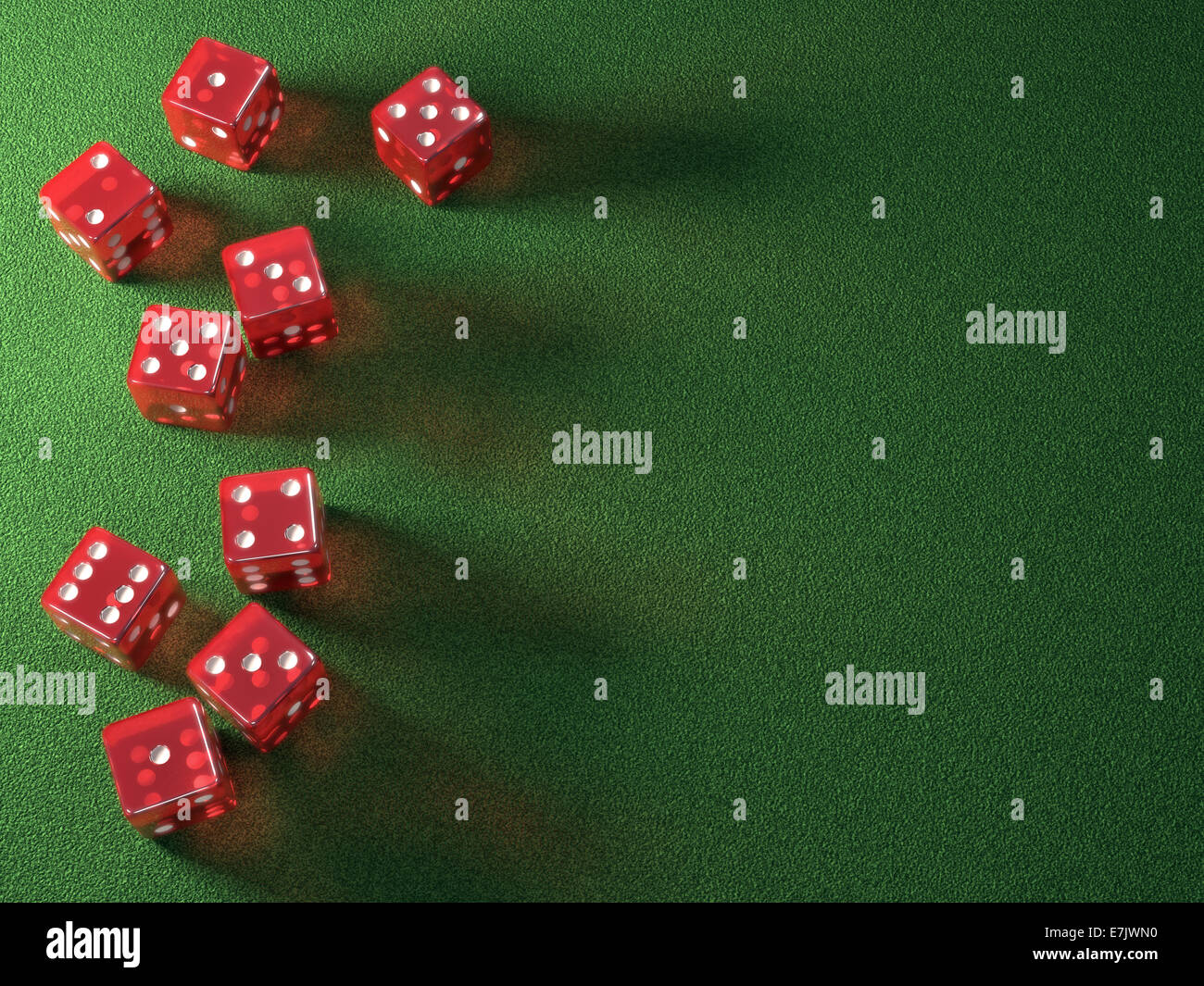 Red dice on green table. Your text on the empty space. Clipping path included. Stock Photo