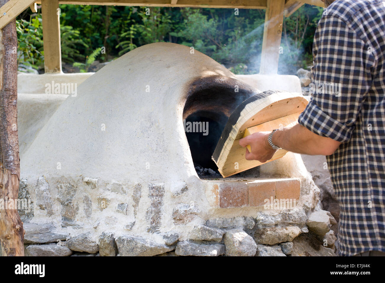 earth clay cob oven project. The oven has been finished at last and now