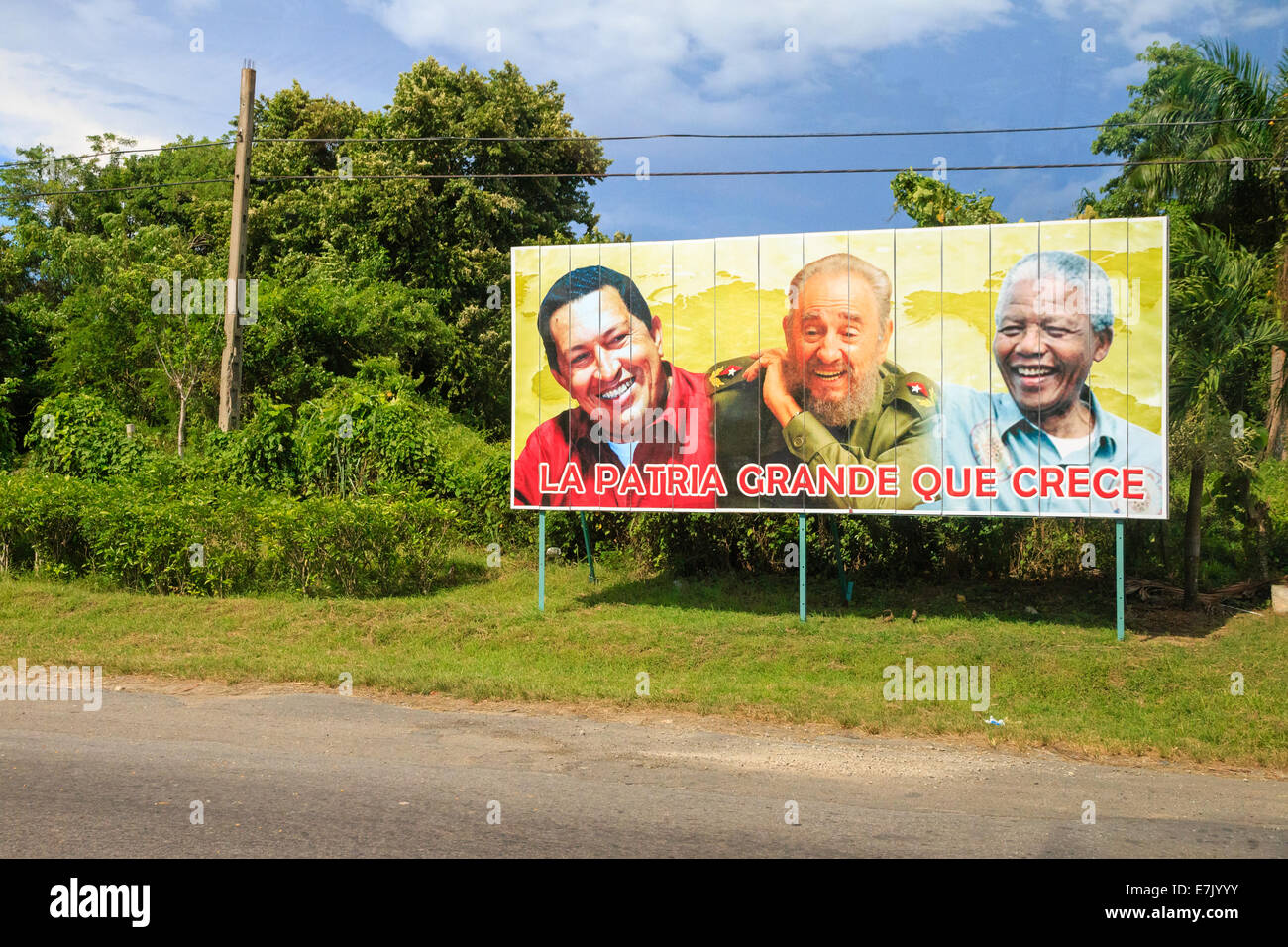 [Editorial Use Only] The portraits of Hugo Chávez, Fidel Castro and Nelson Mandela on a political billboard in Cuba Stock Photo