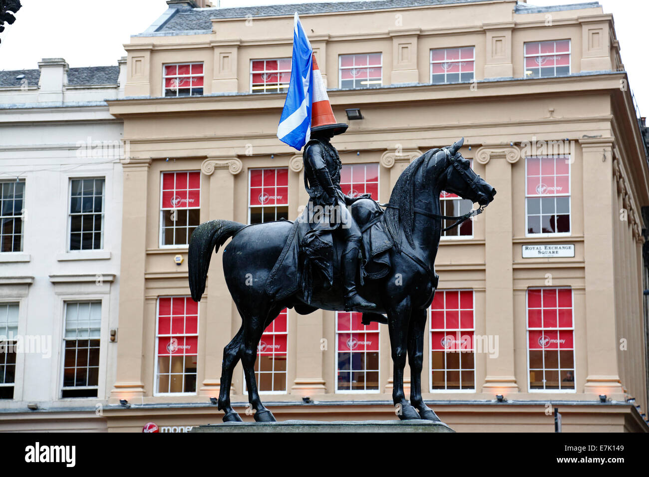 Royal Exchange Square, Glasgow, Scotland, UK, Friday, 19th September, 2014. On the day after Scotland Voted in the Independence Referendum the Duke Of Wellington Statue on Royal Exchange Square is decorated with a Scotland Flag in addition to the usual traffic cone. Stock Photo