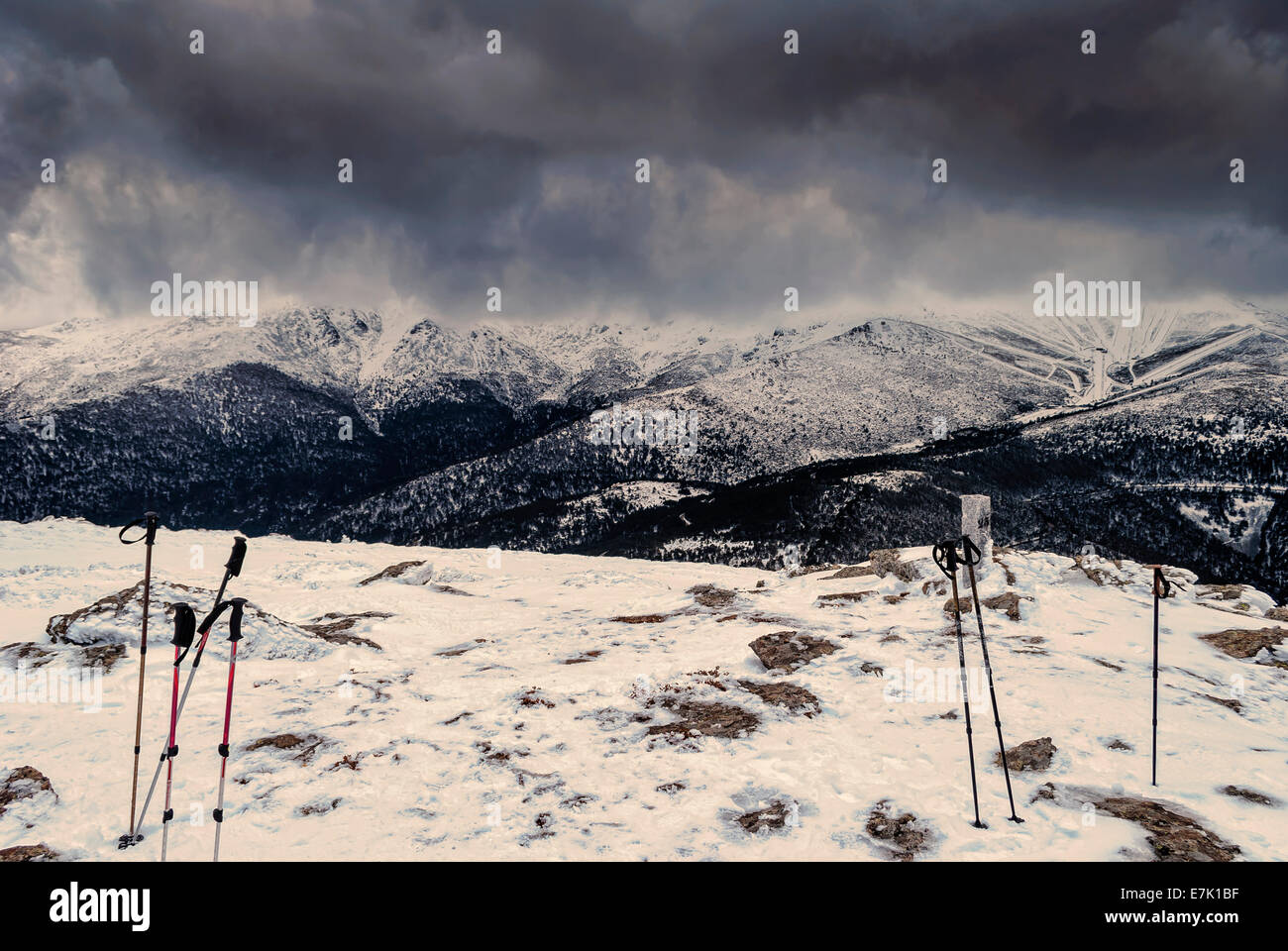 Canes for mountaineering stuck in the snow on the mountain Stock Photo